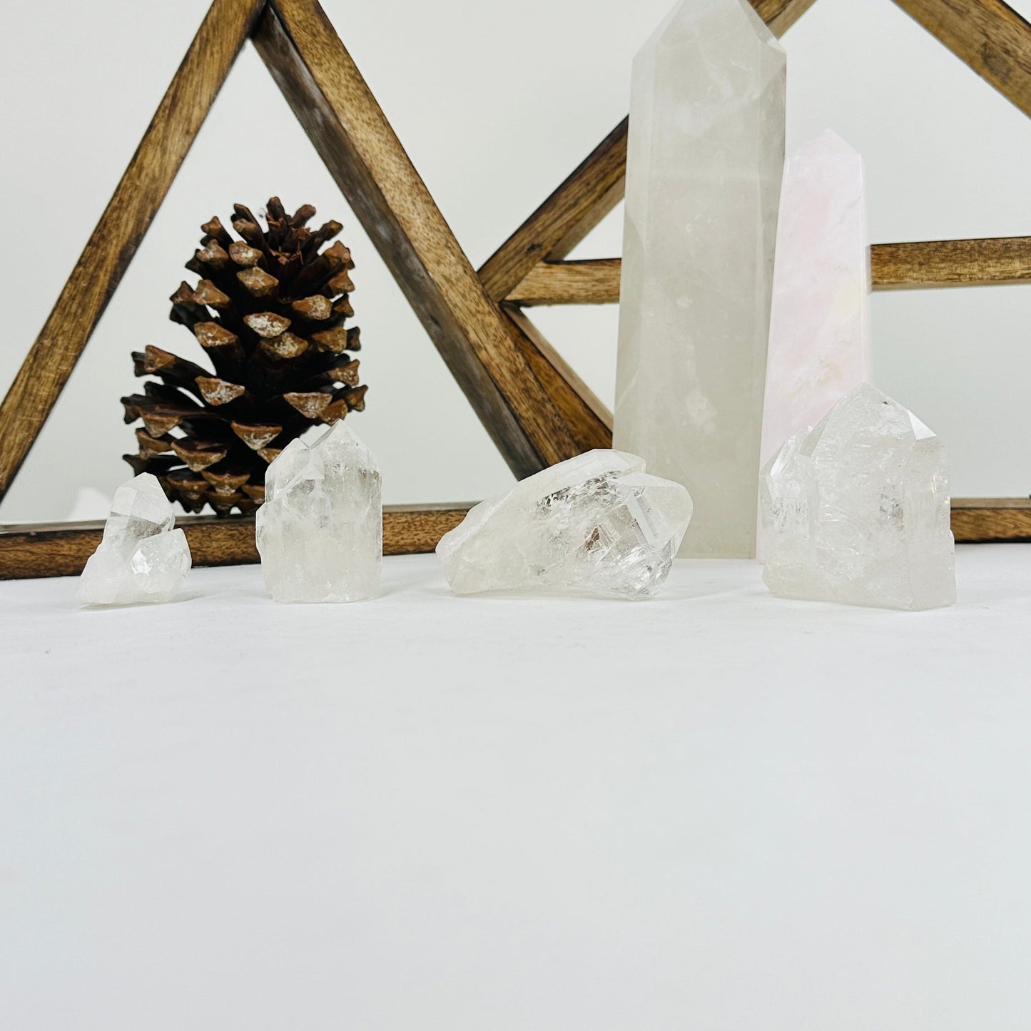 crystal quartz points with decorations in the background