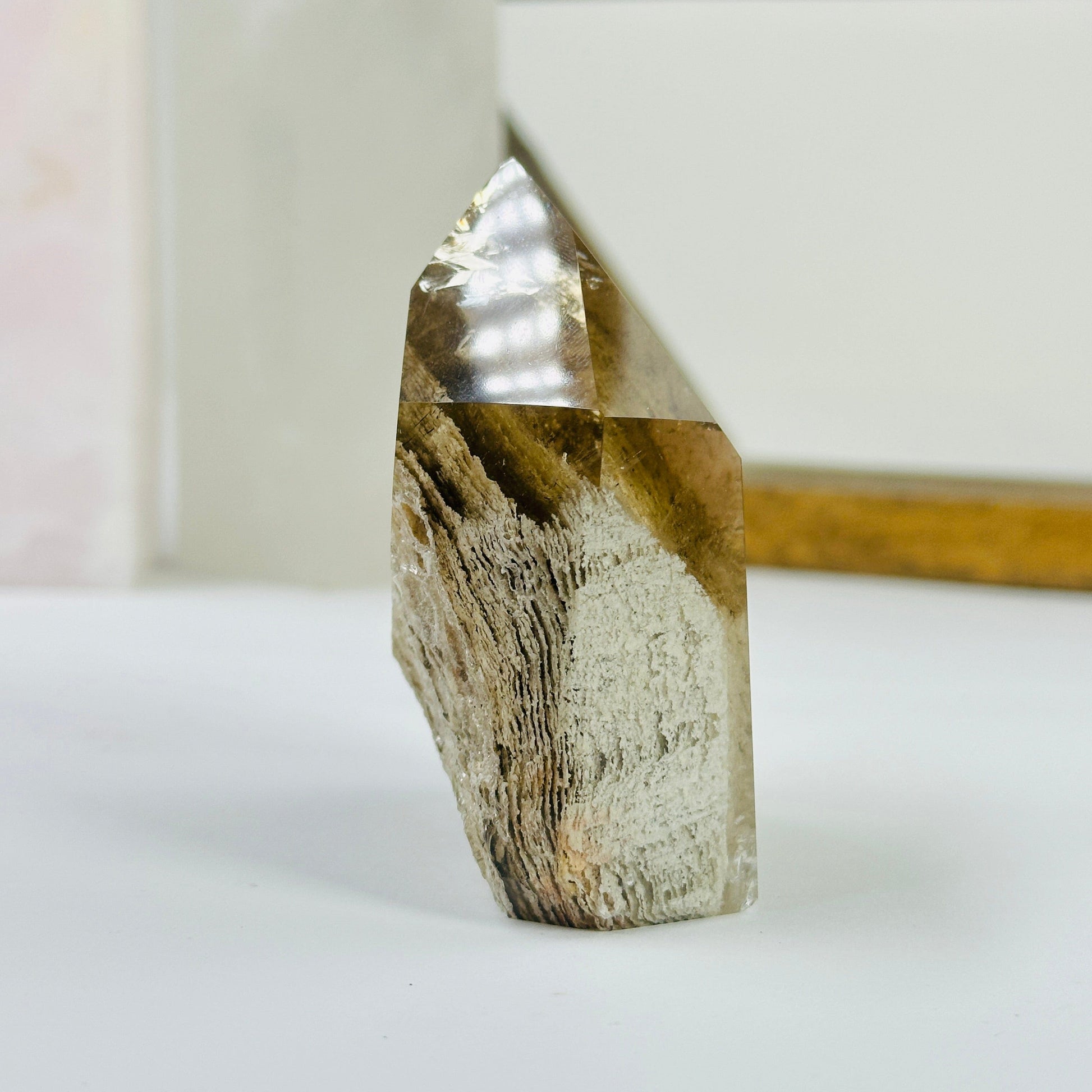 lodalite point with decorations in the background