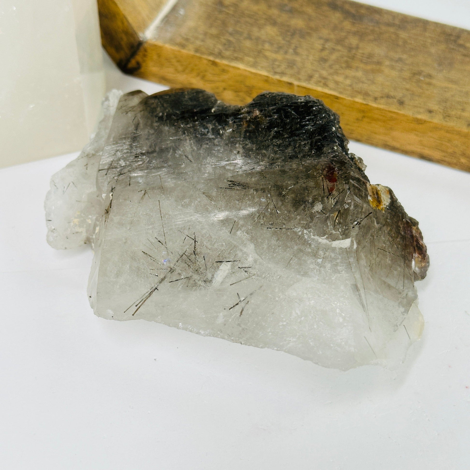 rutile quartz with decorations in the background