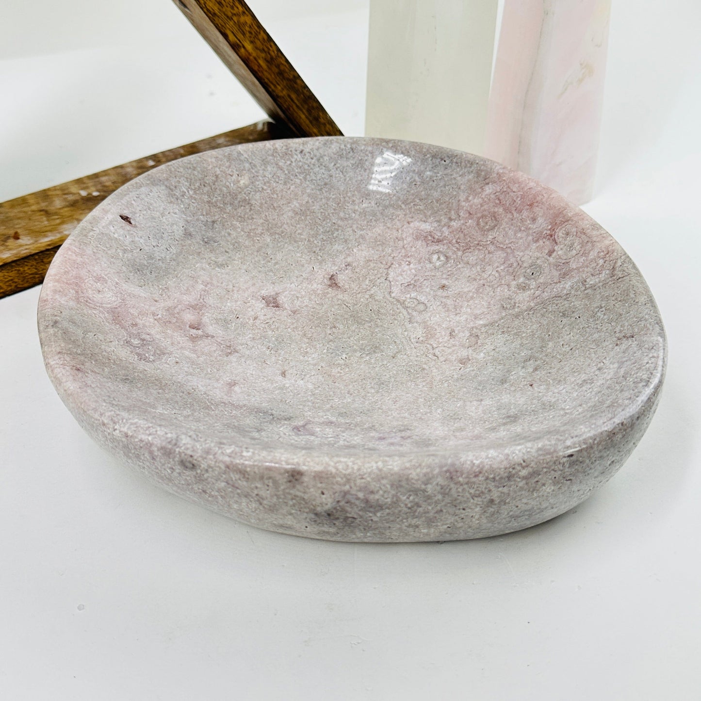 pink amethyst plate with decorations in the background