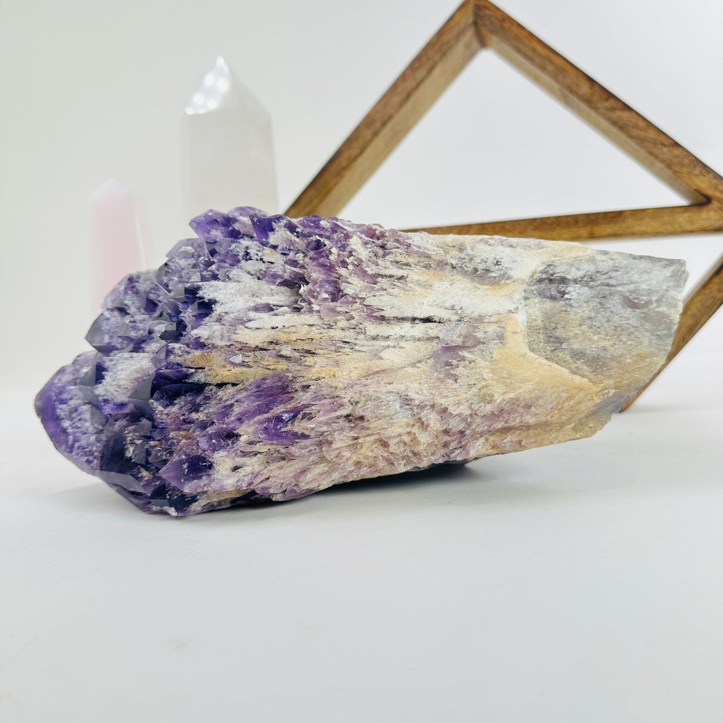 elestial amethyst with decorations in the background