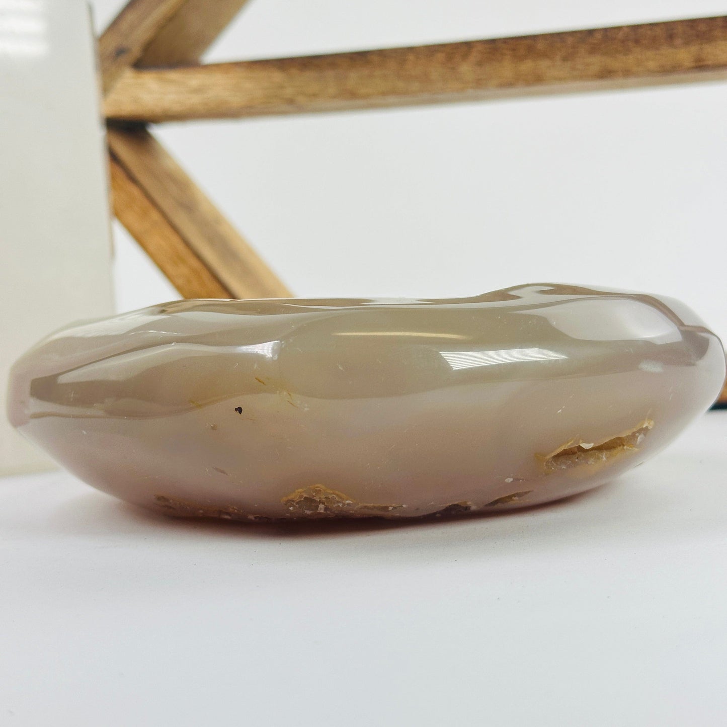 agate heart with decorations in the background