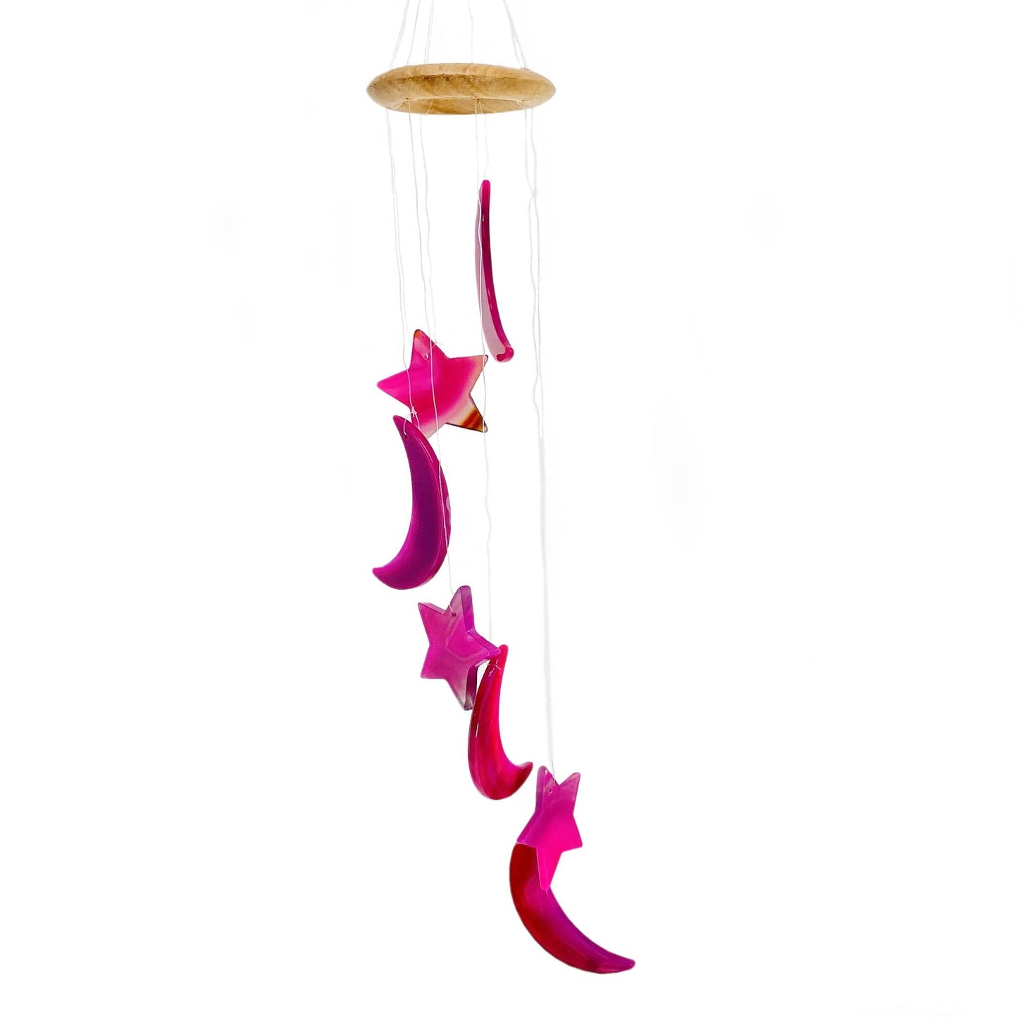 One pink Agate Moon and Star Wind Chime hung with a white background.