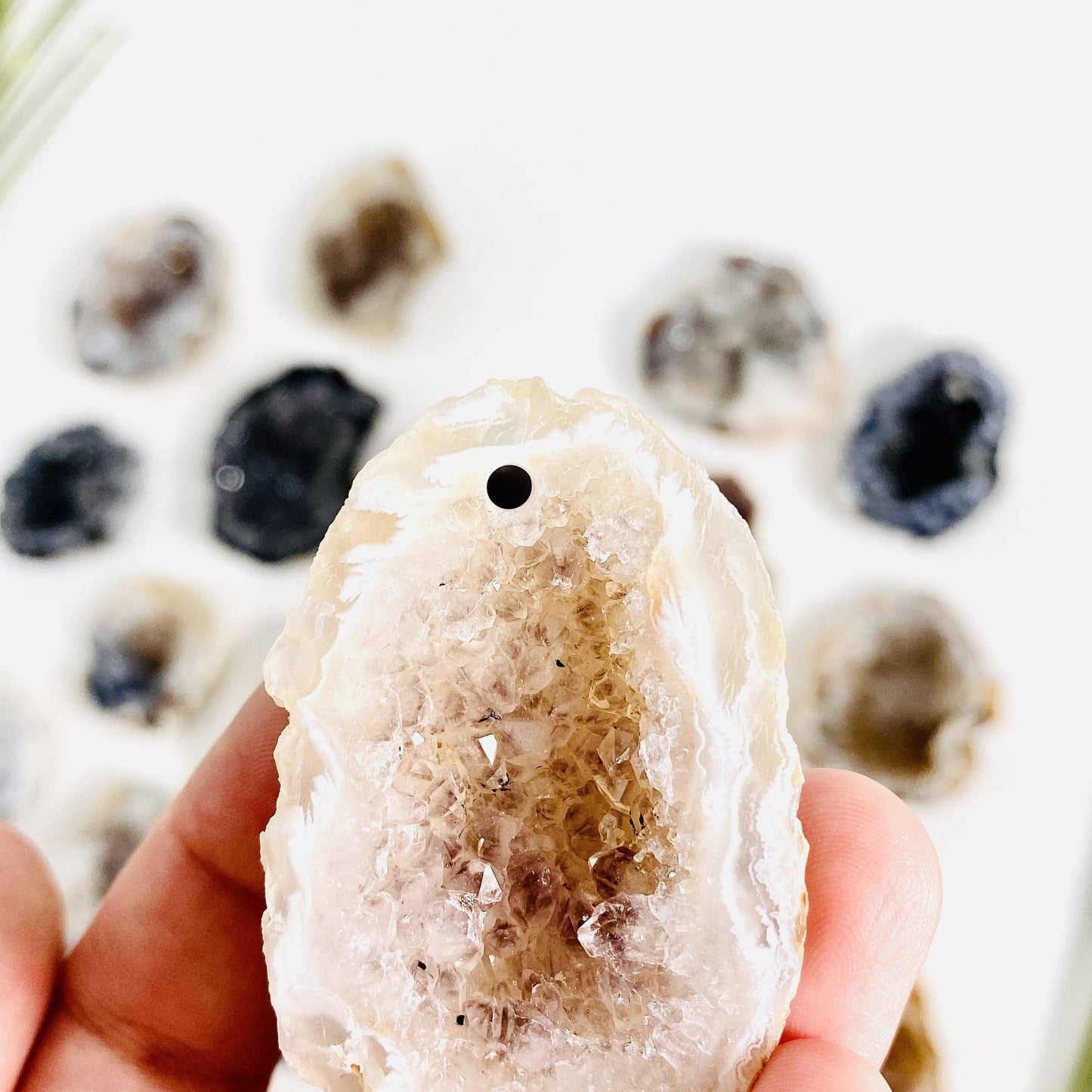 drilled druzy geode with others in the background