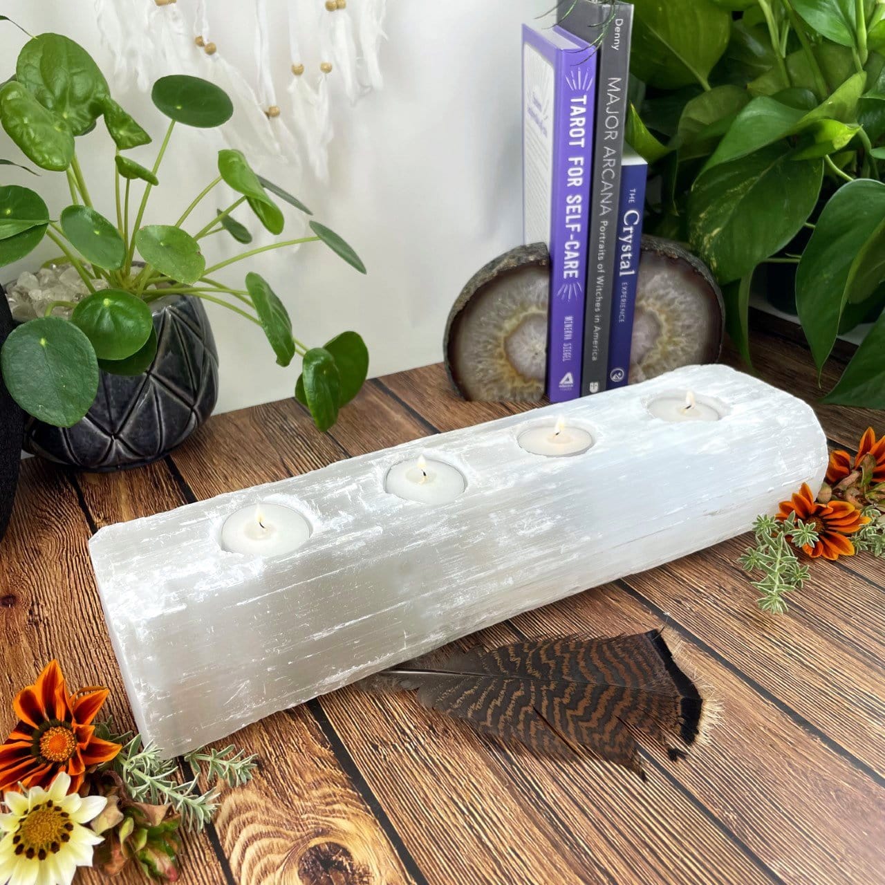 4 votive selenite candle holder on display