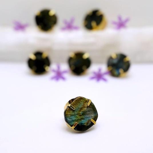 labradorite ring displayed on white ground
