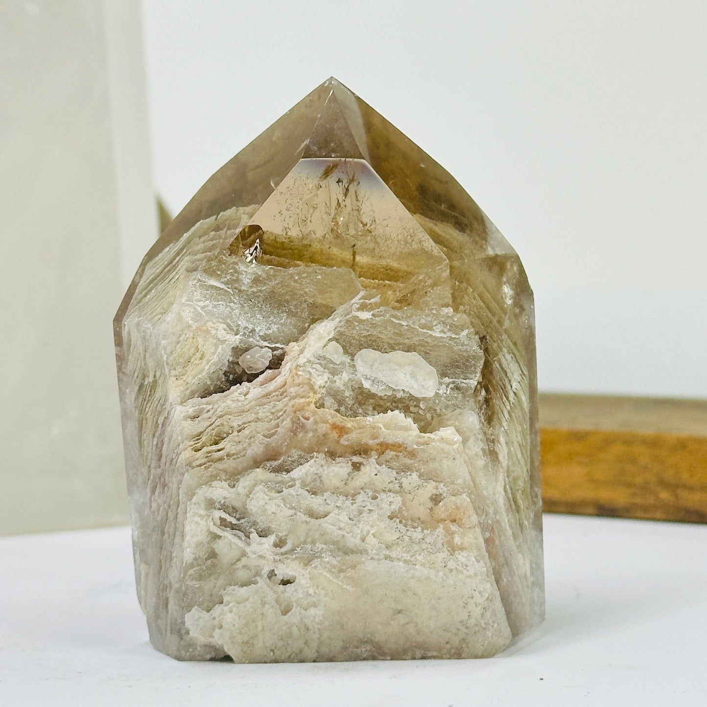 lodalite point with decorations in the background