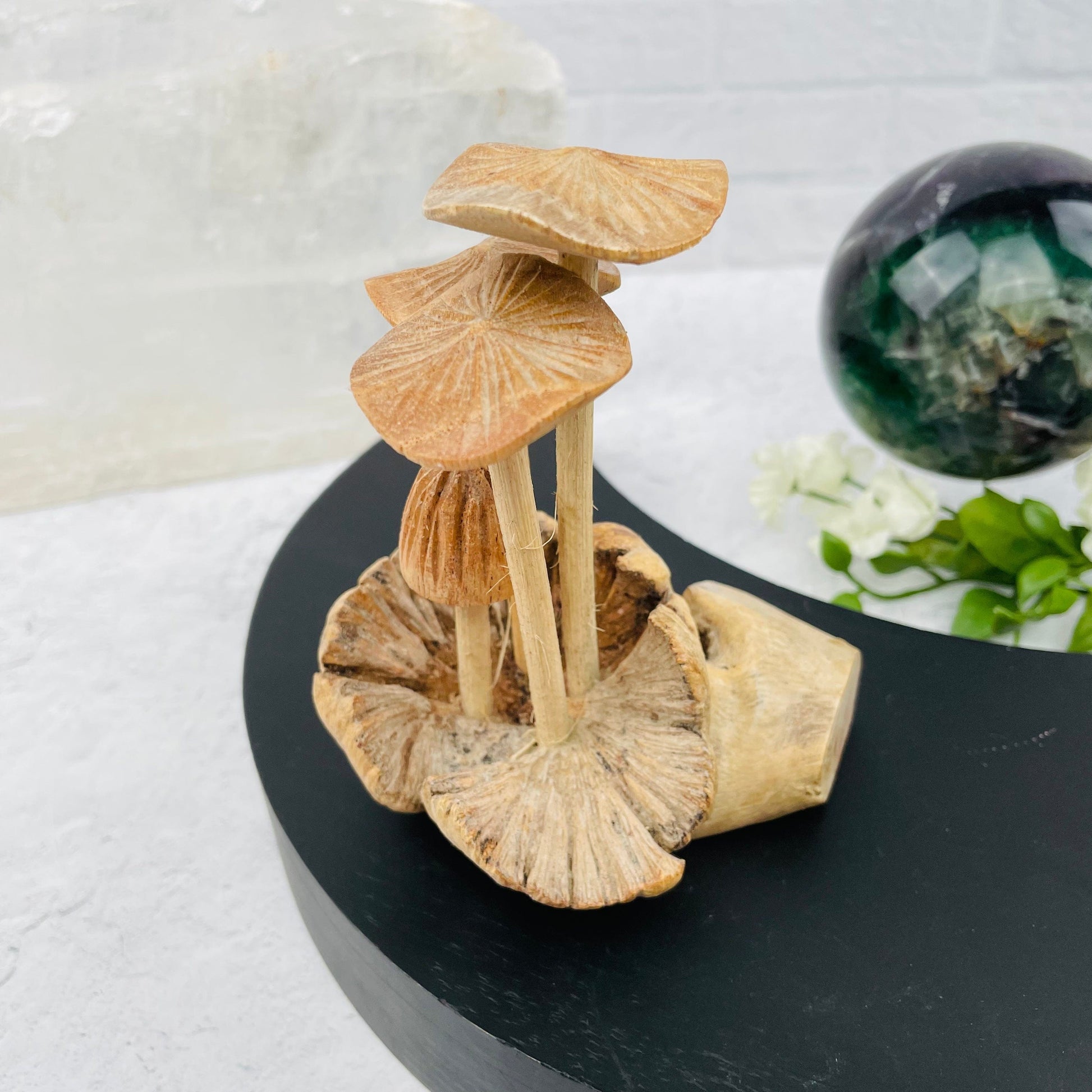 carved mushroom displayed as home decor