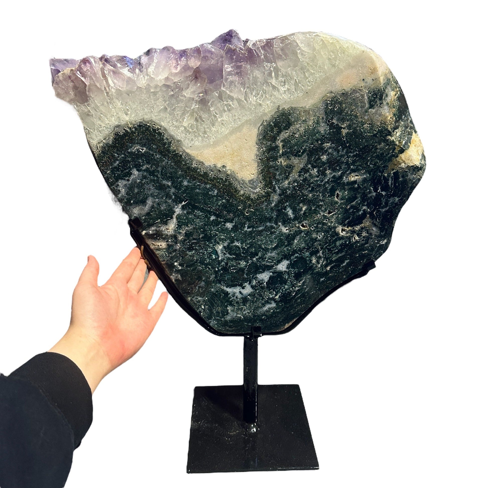 amethyst with jasper on metal stand on white background