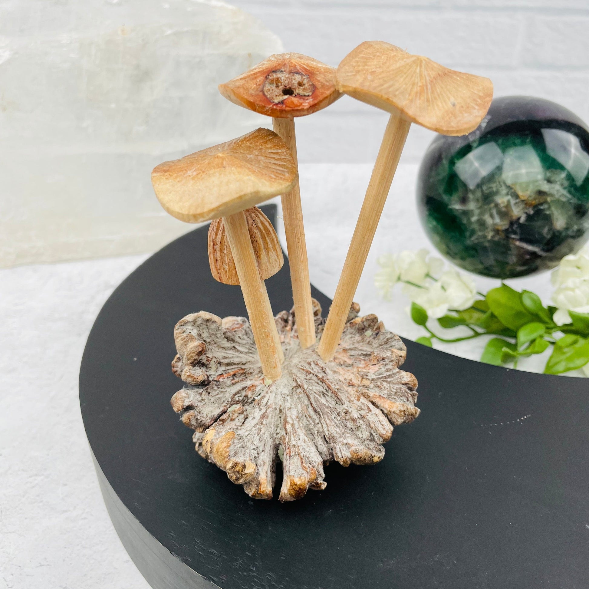 carved mushroom displayed as home decor