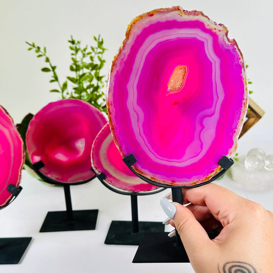Pink Agate Crystal Slice on Stand - You Choose variant 4 in hand for size reference with other variants in the background