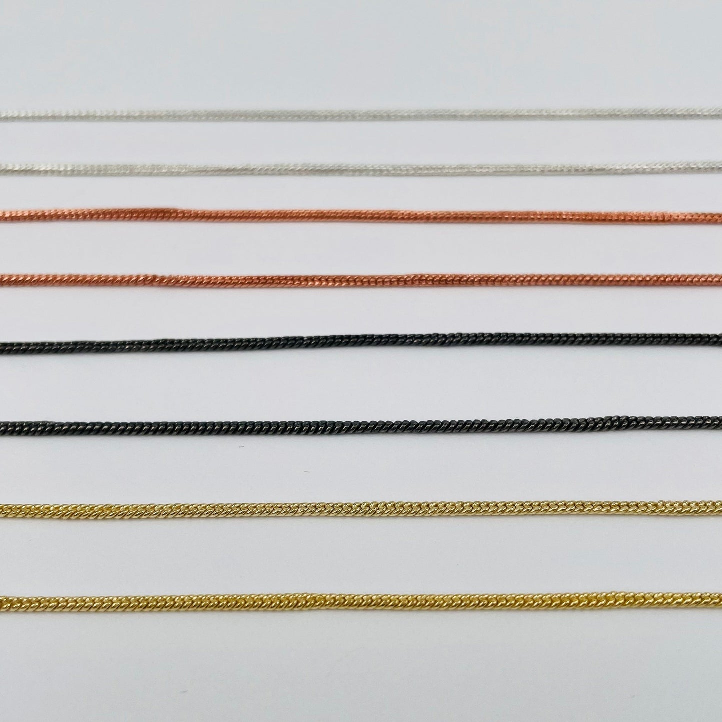 close up of the snake skin link chain necklace 