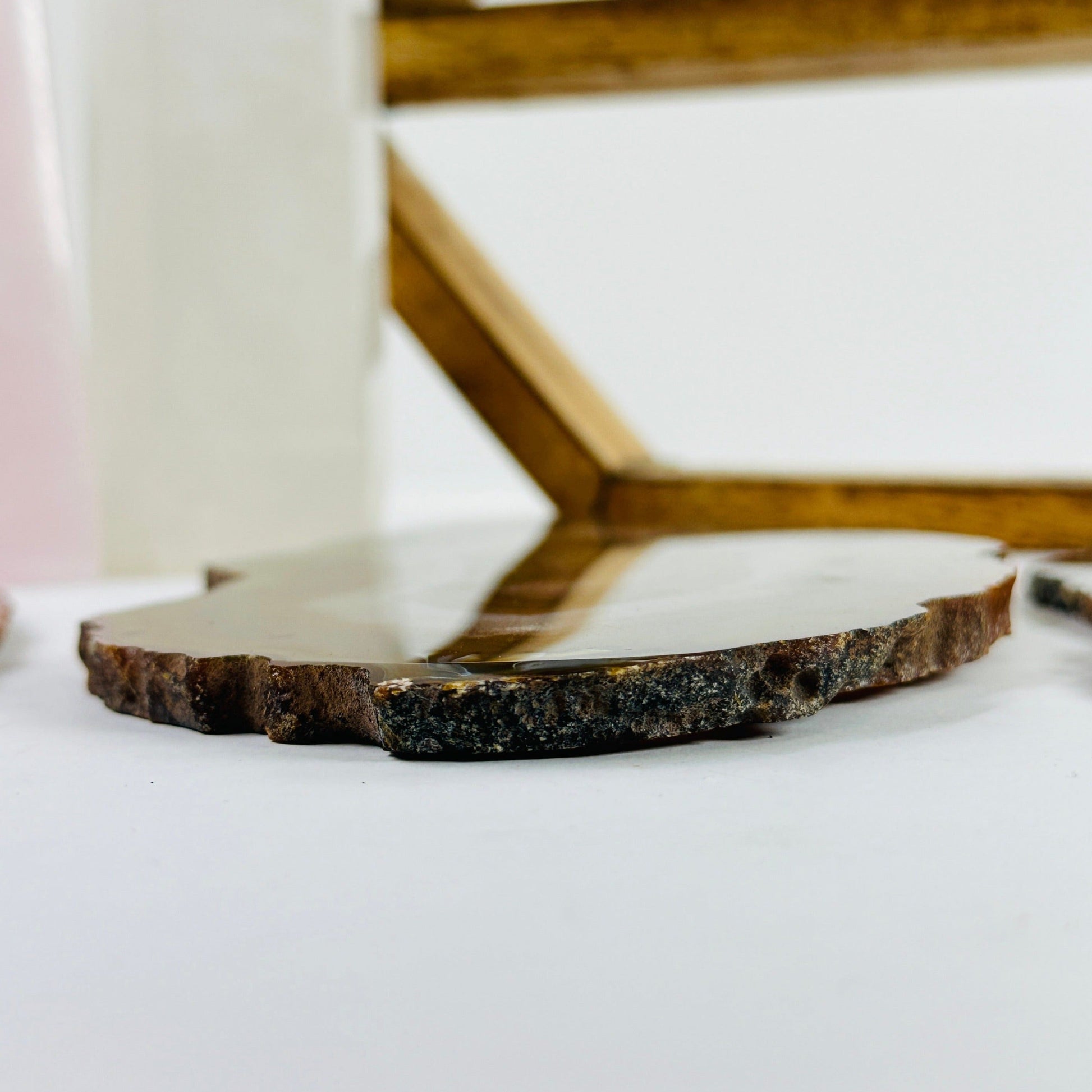 agate slices with decorations in the background