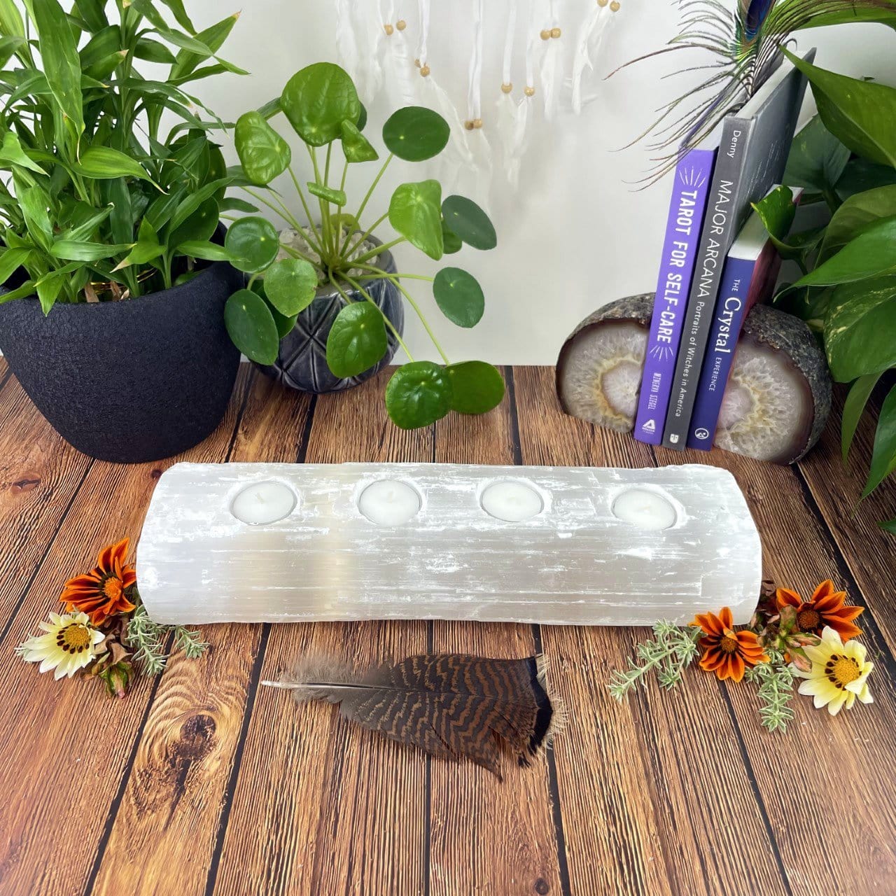 4 votive selenite candle holder on display