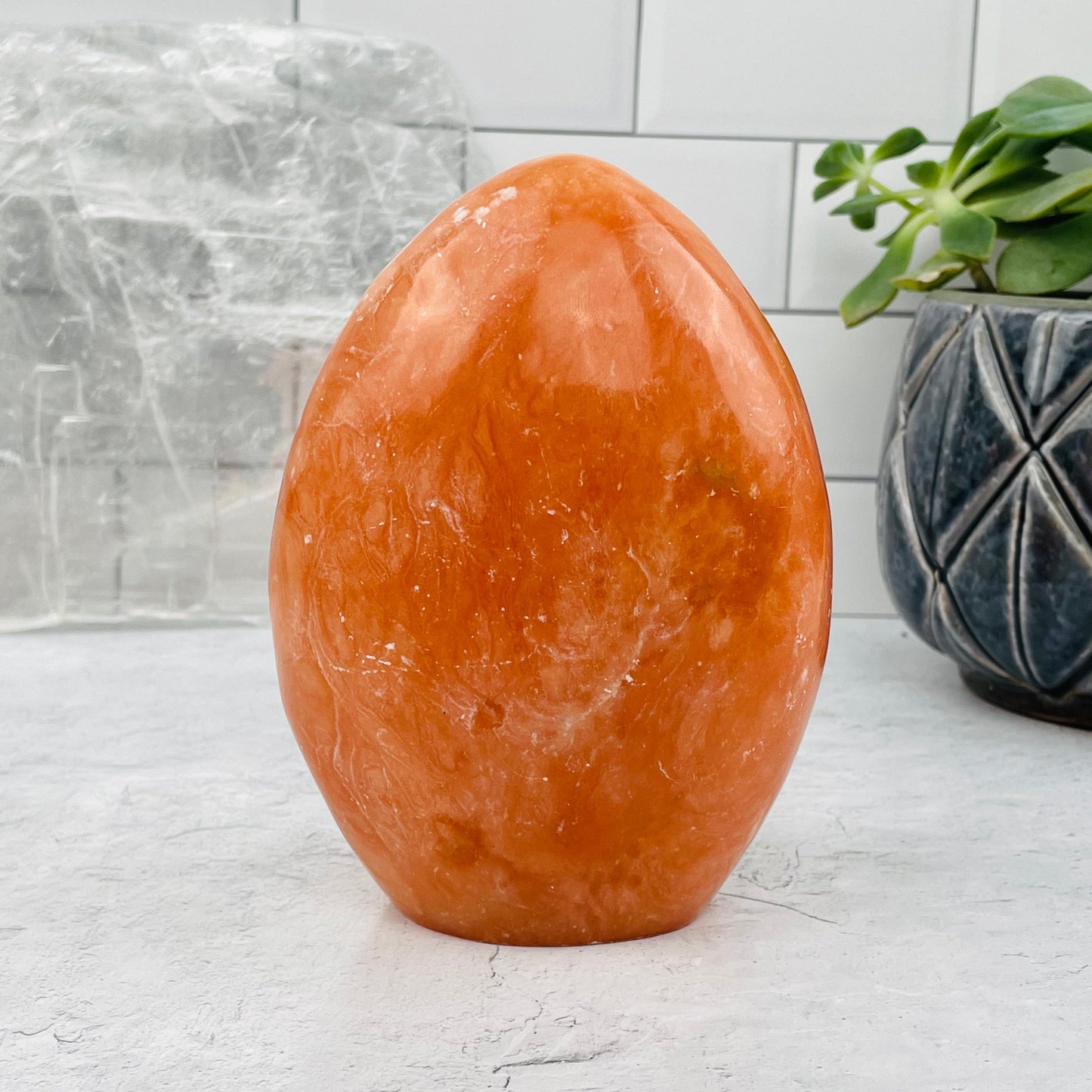 Peach Aventurine Cut Base displayed as home decor 