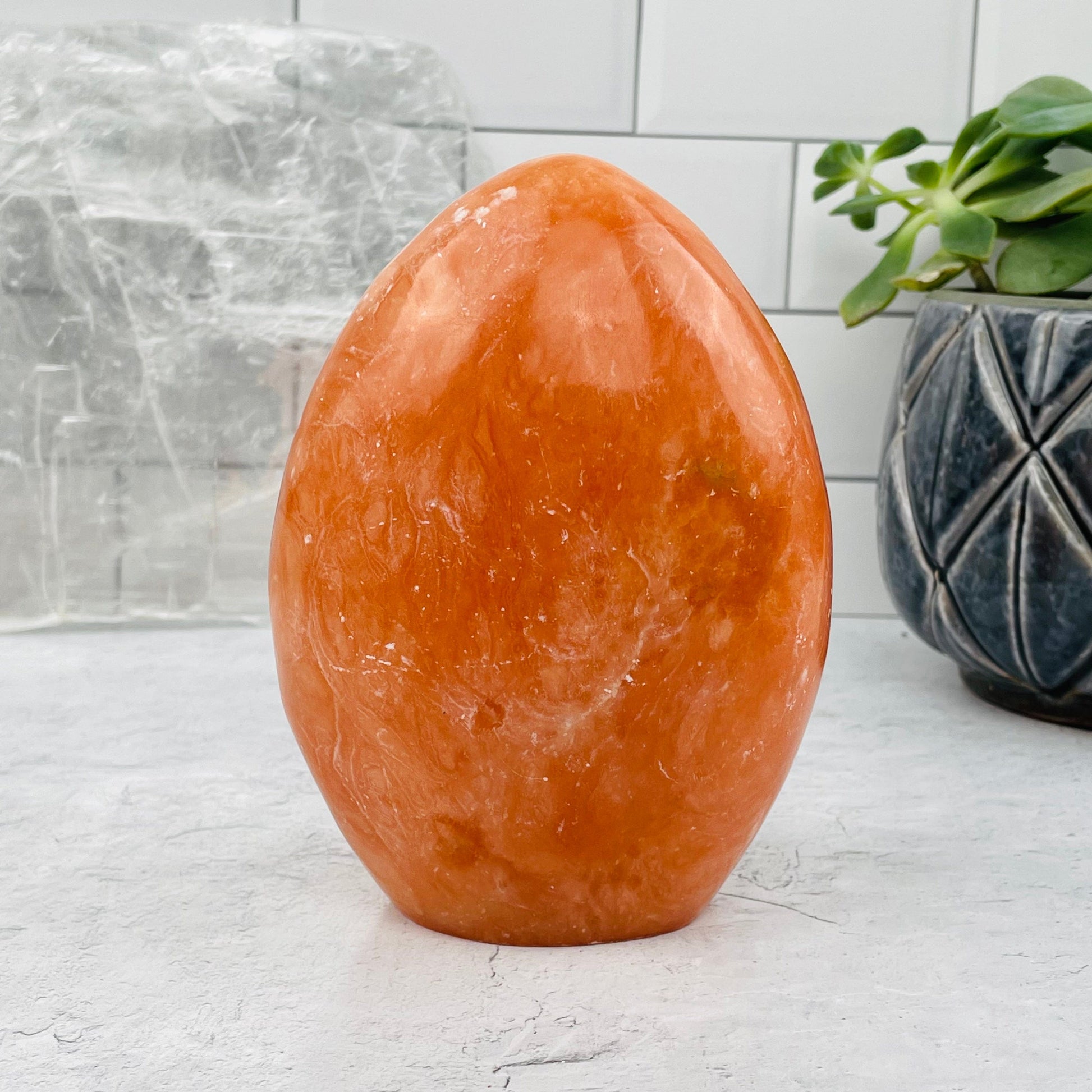Peach Aventurine Cut Base displayed as home decor 