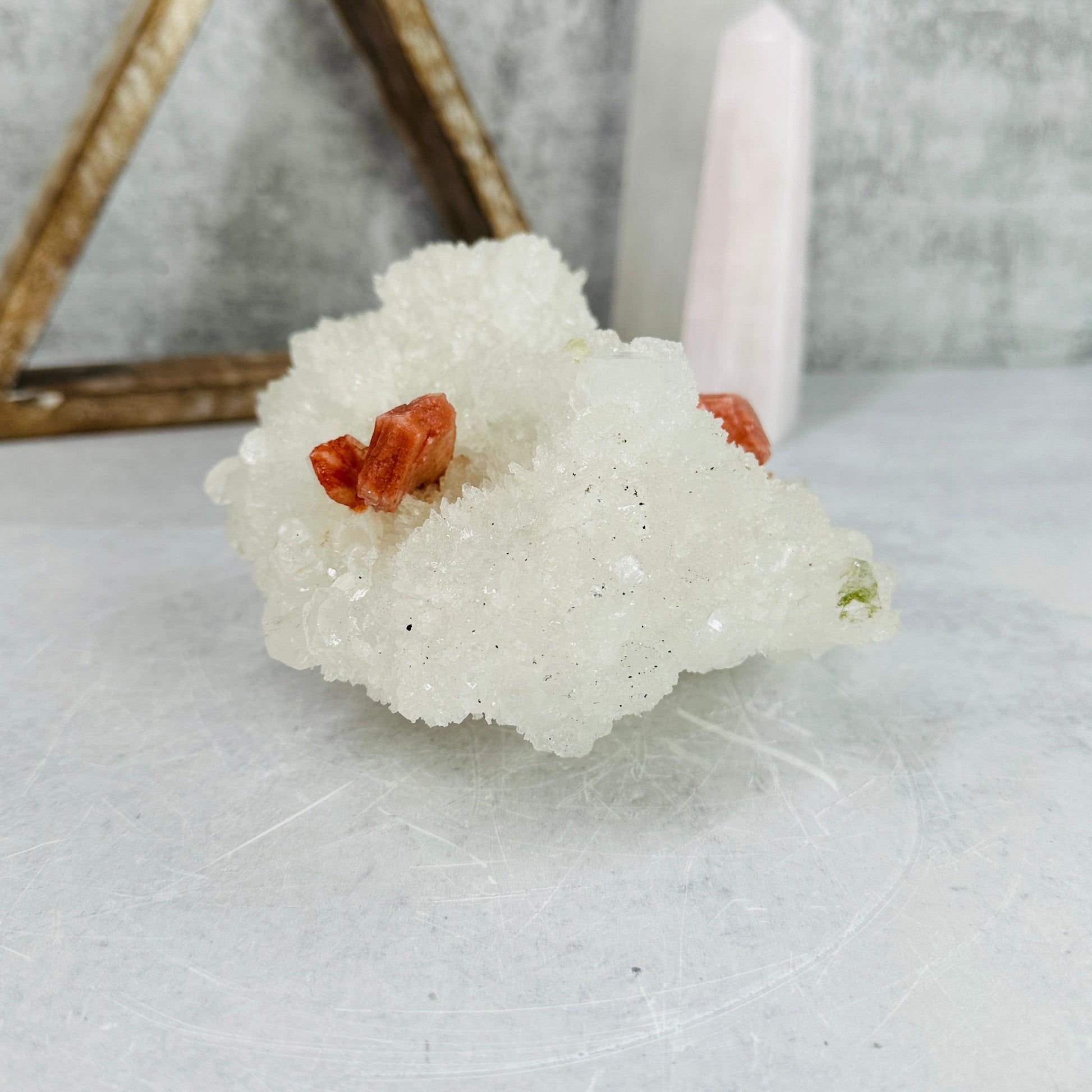 apophyllite with stilbite cluster with decorations in the background