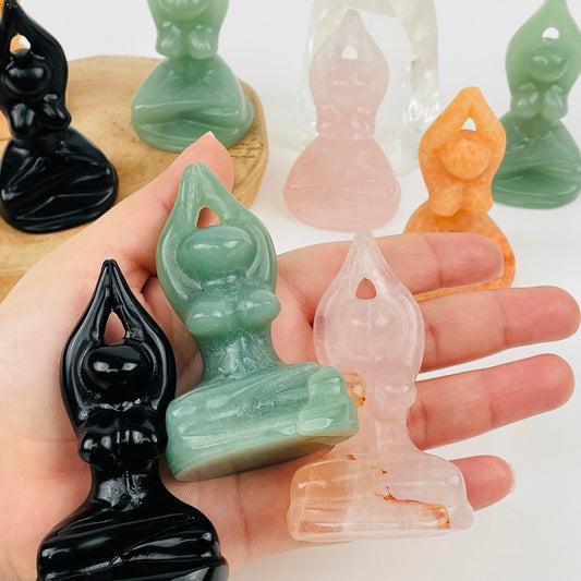 multiple crystal goddesses in hand for size reference 