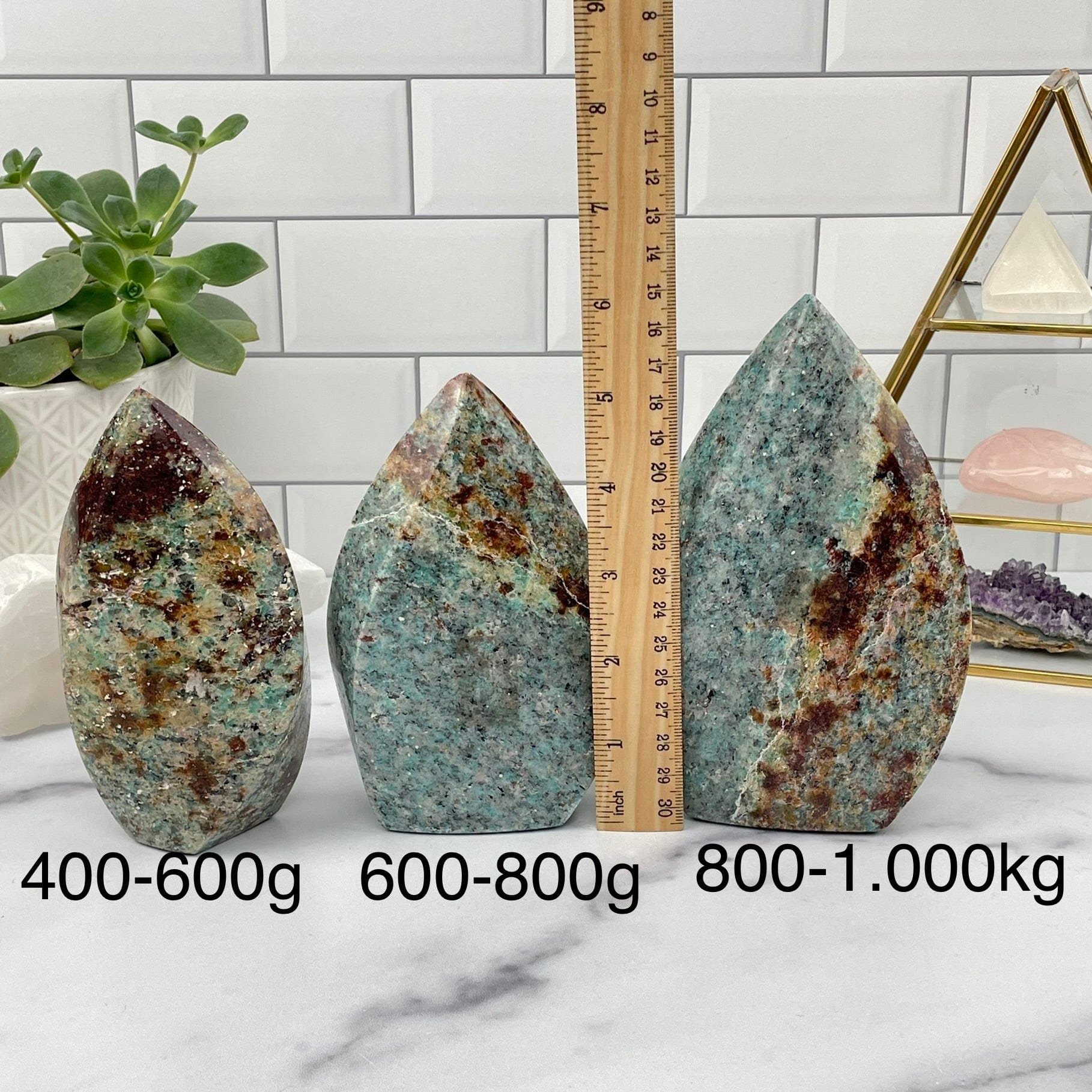 amazonite flame points next to a ruler for size reference. sold by weight 
