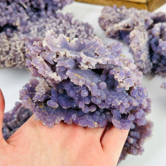 grape agate with decorations in the background