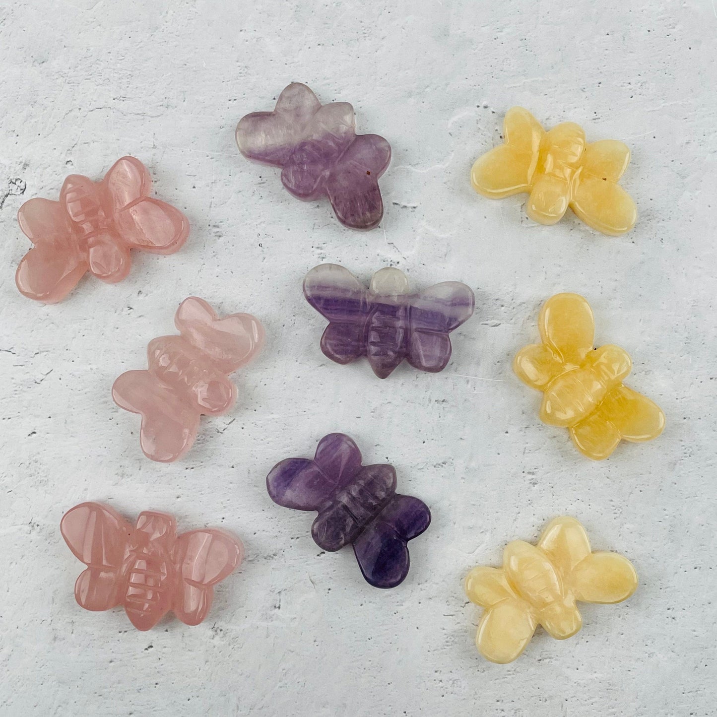 multiple bees displayed to show the differences in the crystal types
