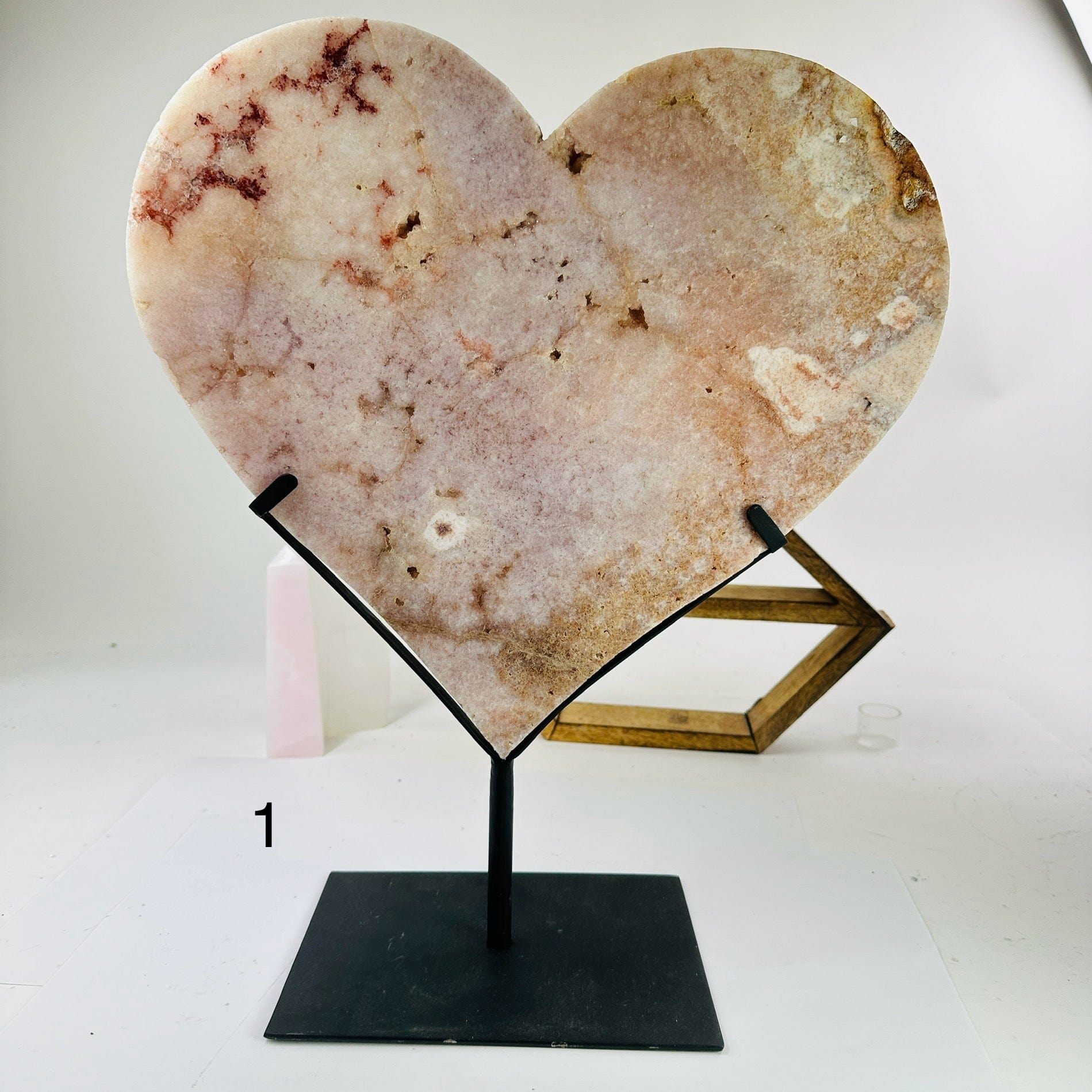 pink amethyst hearts with decorations in the background