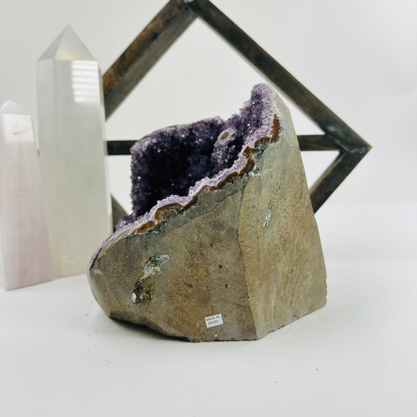 amethyst cut base with decorations in the background