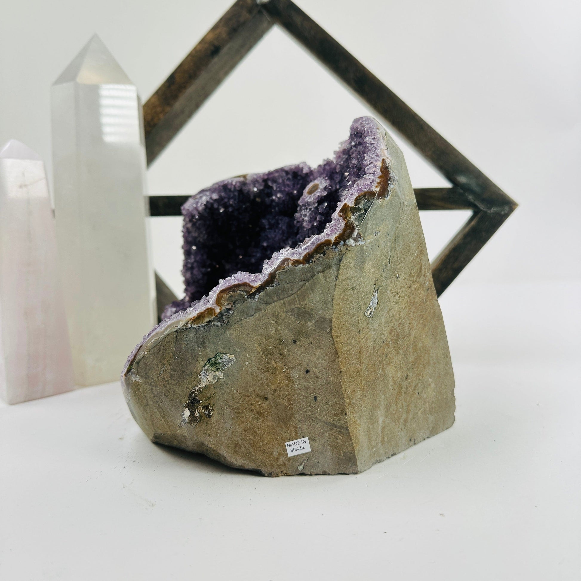 amethyst cut base with decorations in the background
