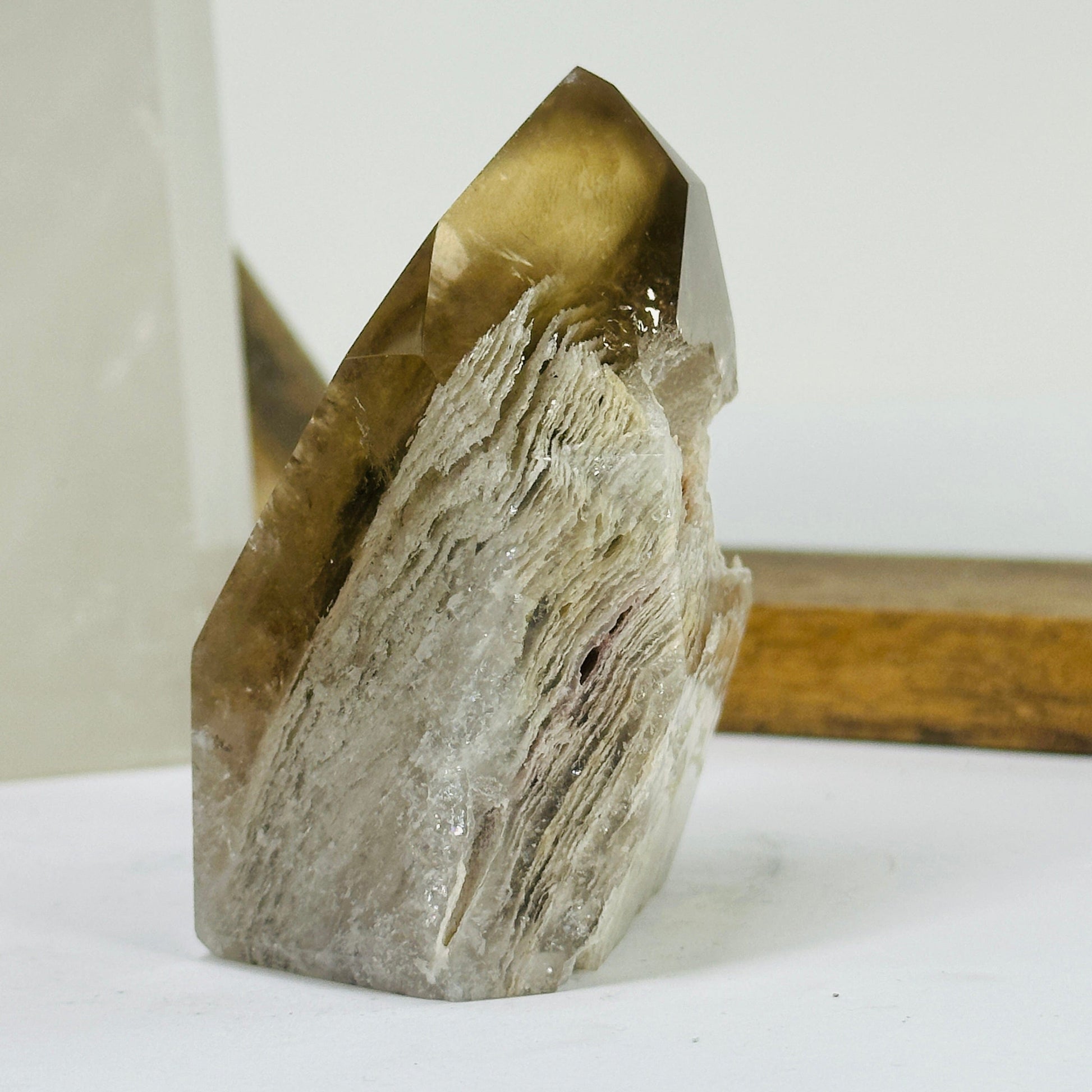 lodalite point with decorations in the background