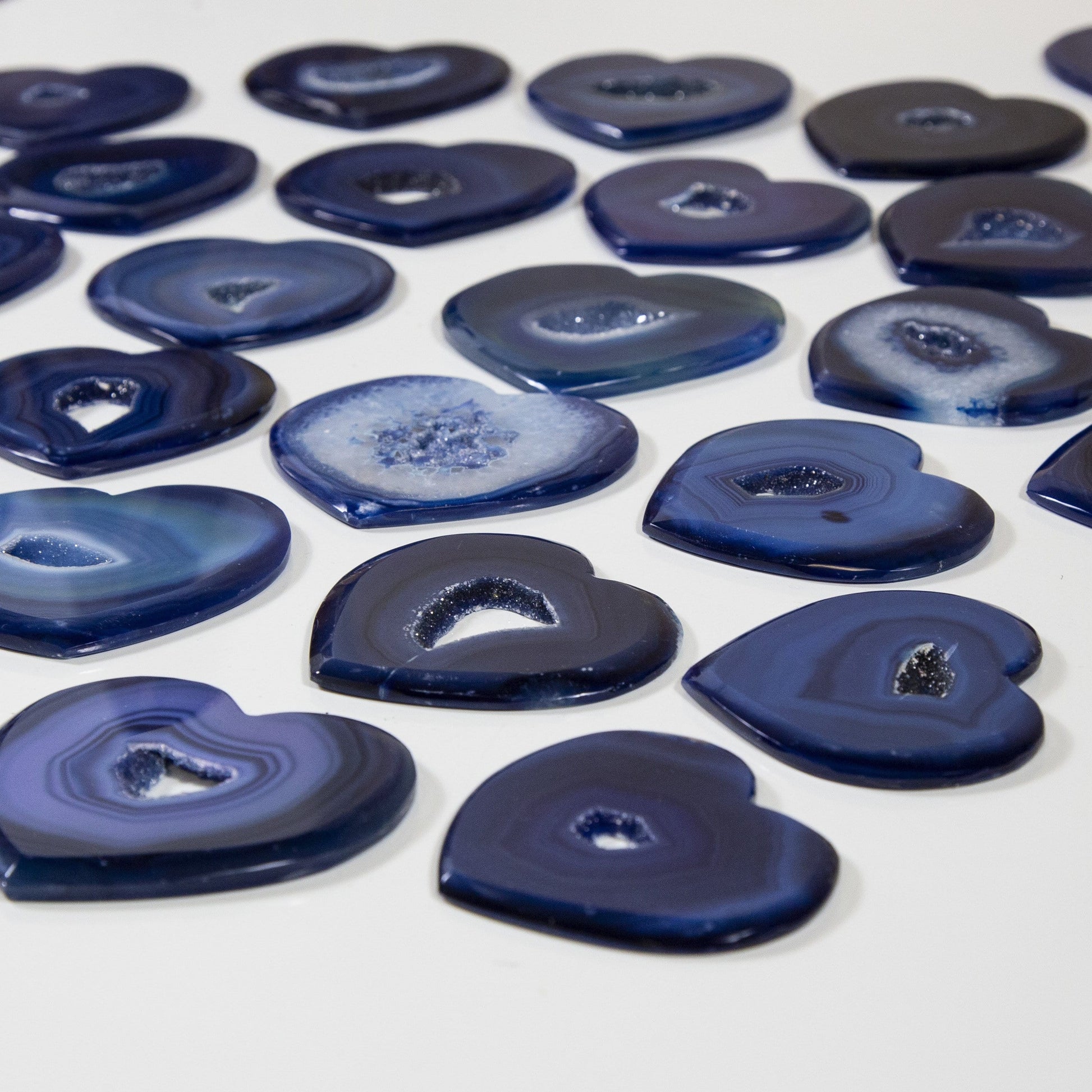 side view of agate hearts for thickness reference