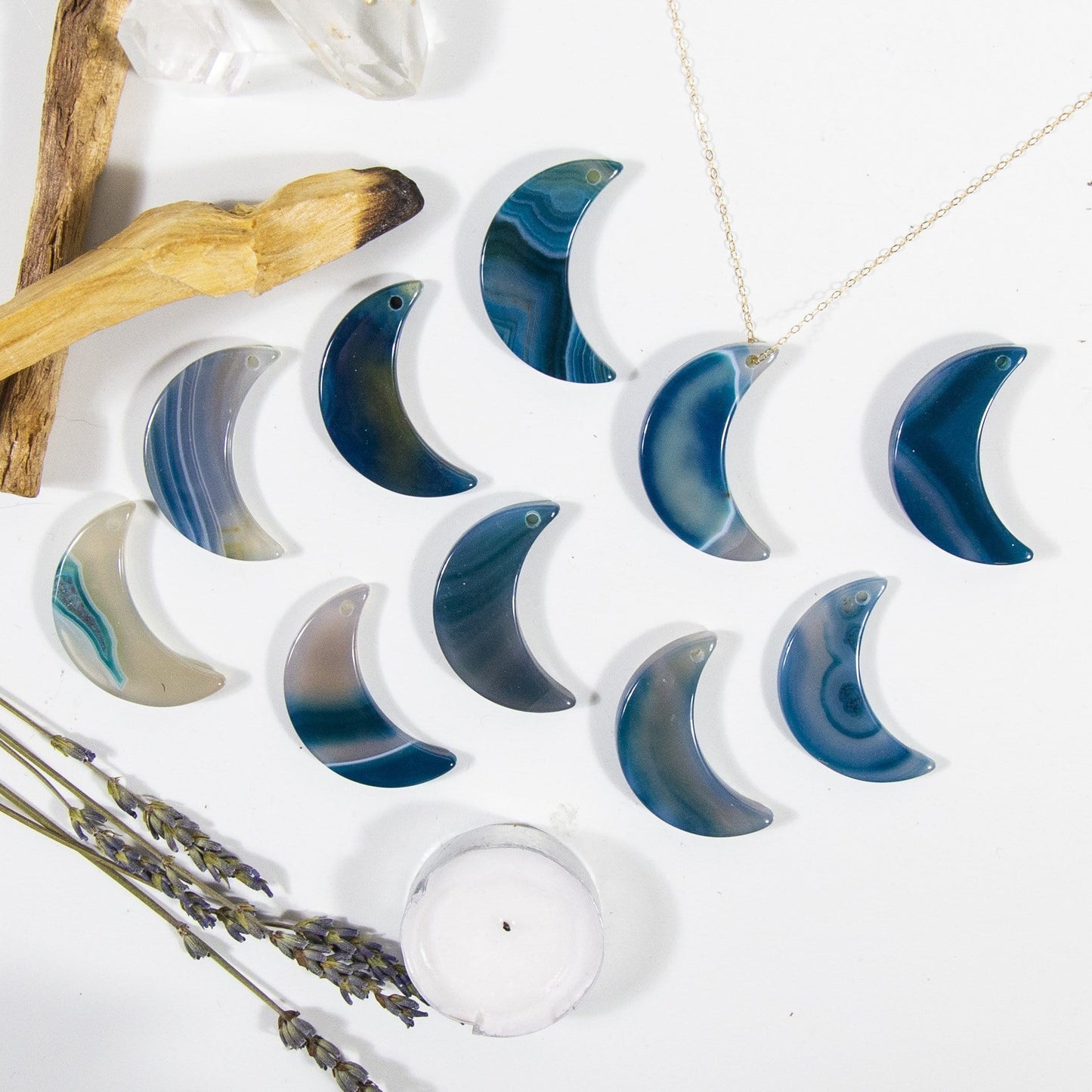Multiple Teal Drilled Half Moon Agate With Necklace on White Background