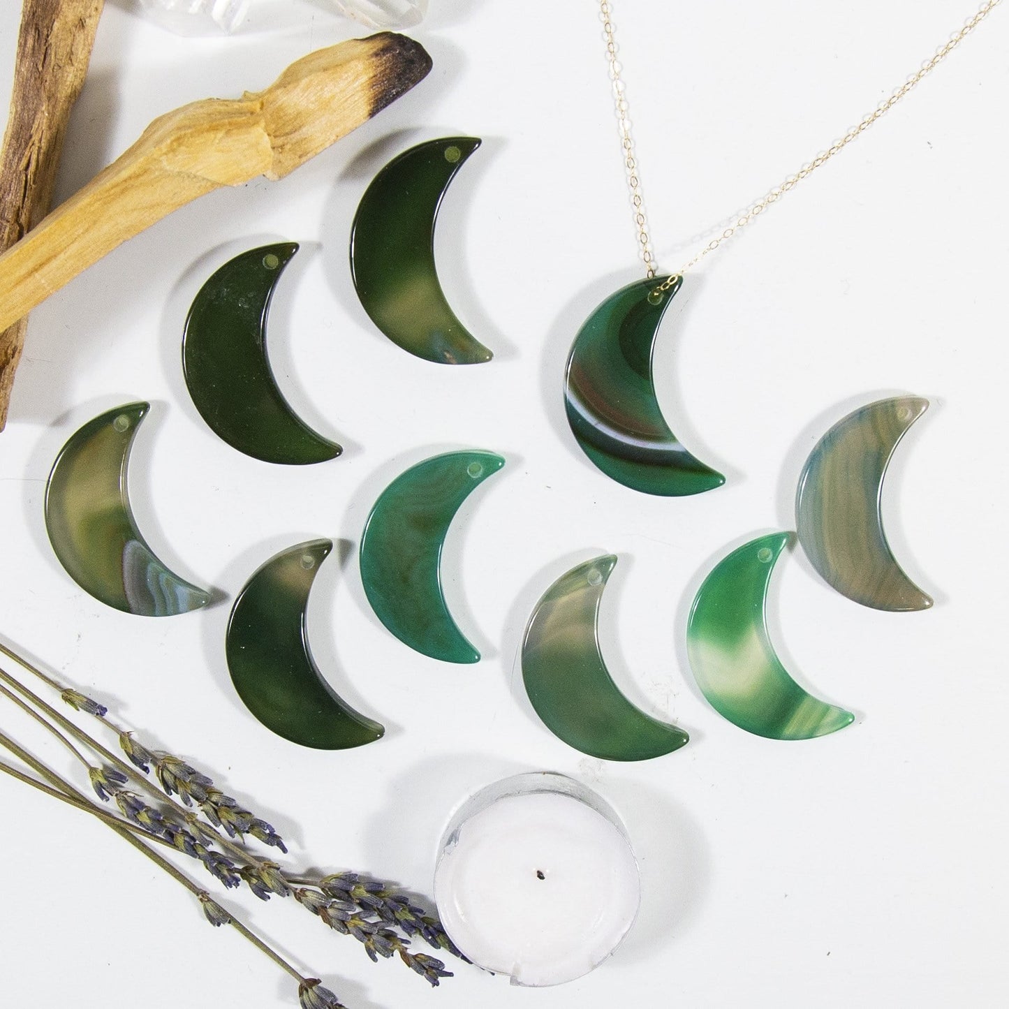Multiple Green Drilled Half Moon Agate With Necklace on White Background