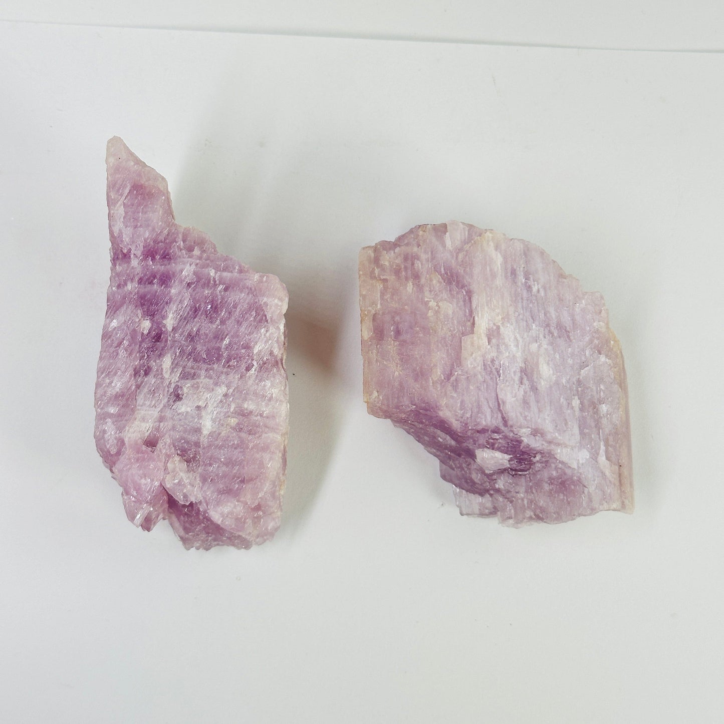 kunzite with decorations in the background