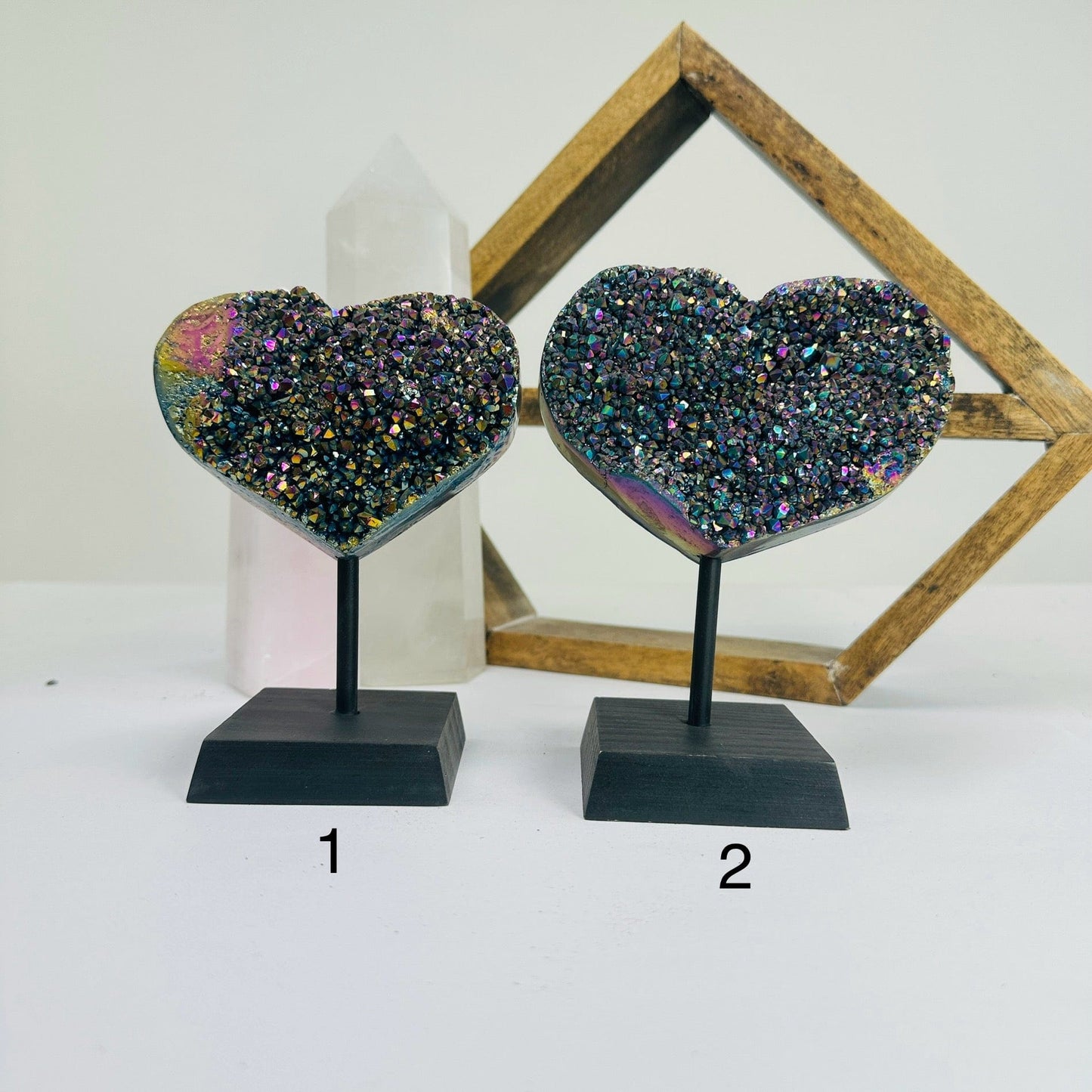 titanium coated heart on stand with decorations in the background