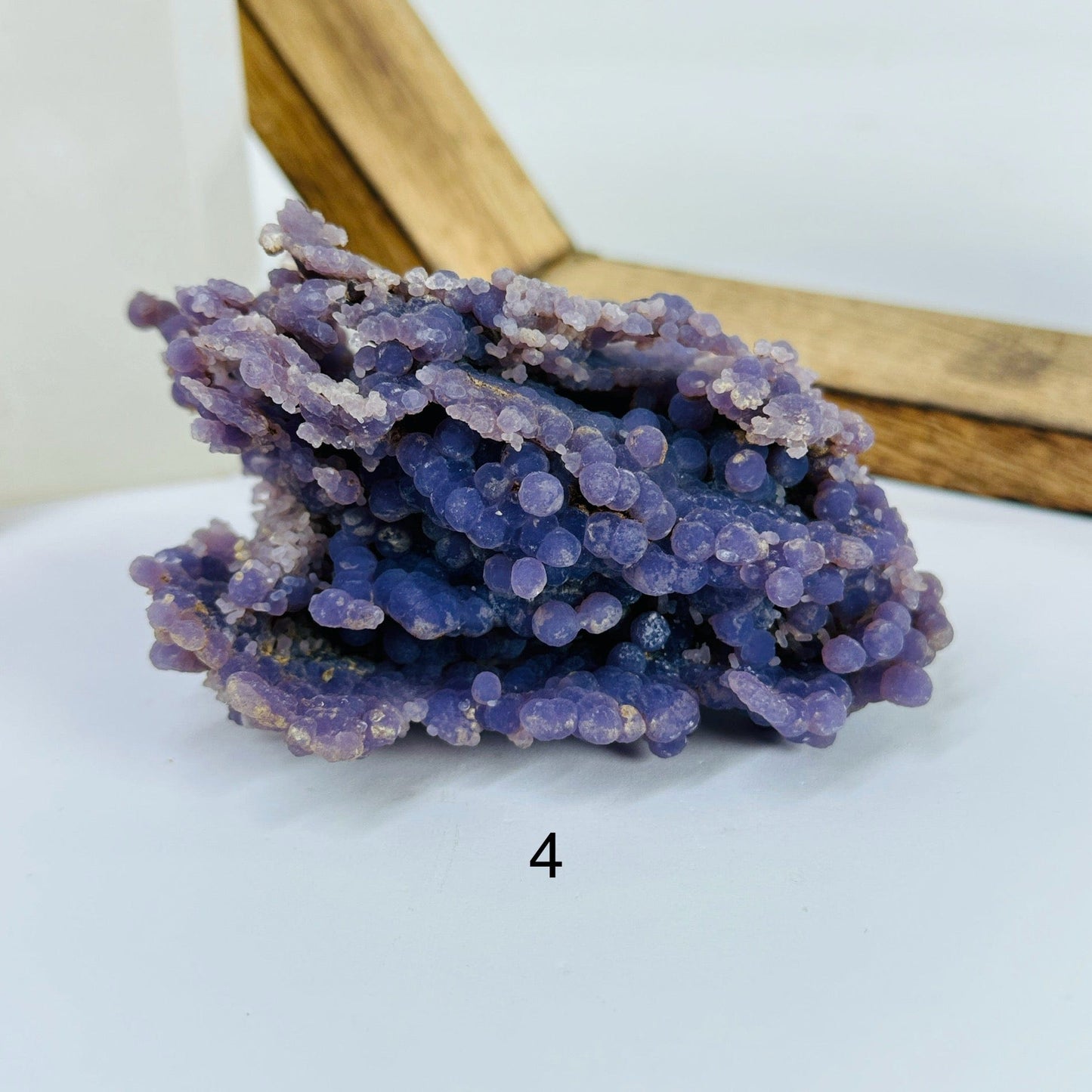 grape agate with decorations in the background