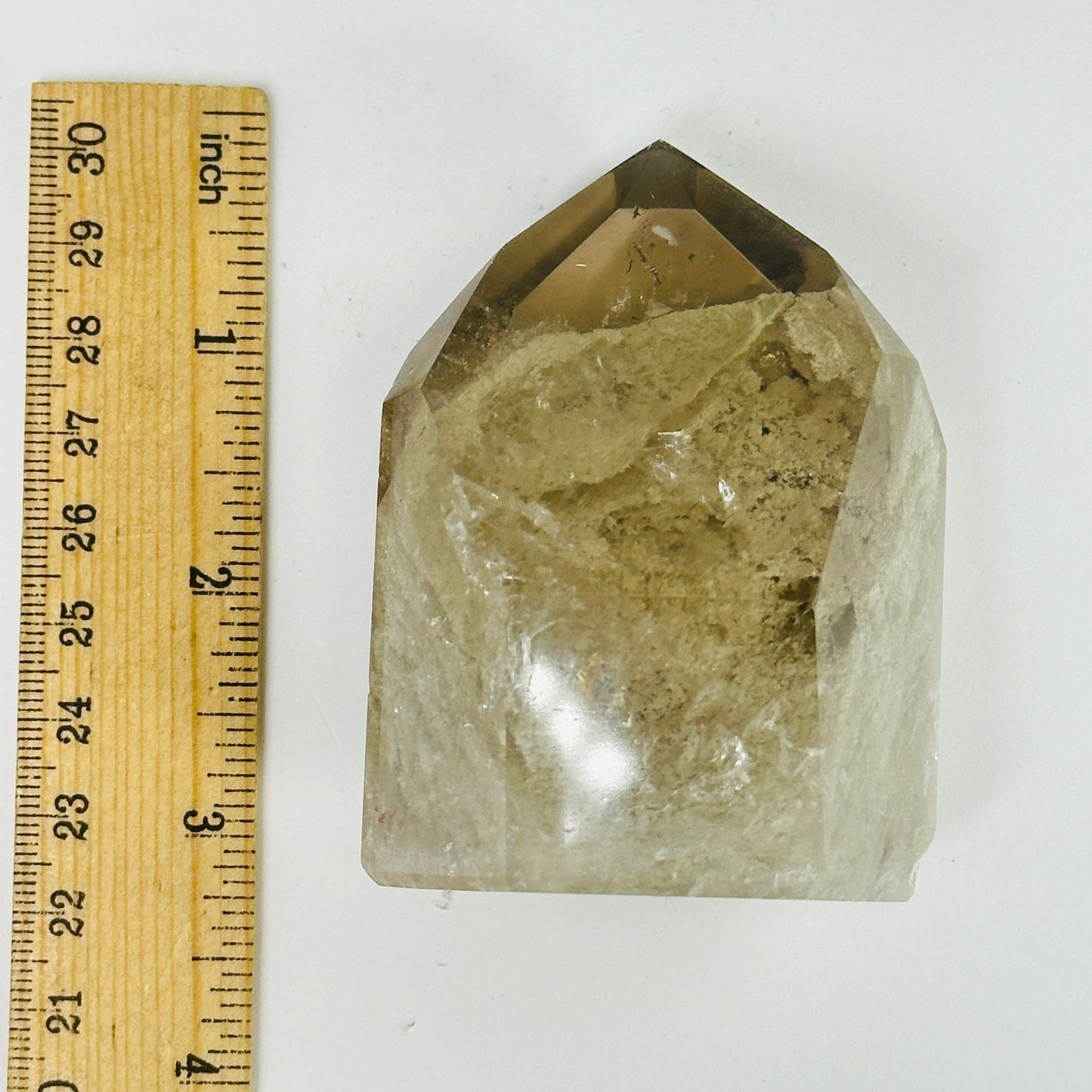 lodalite point next to a ruler for size reference