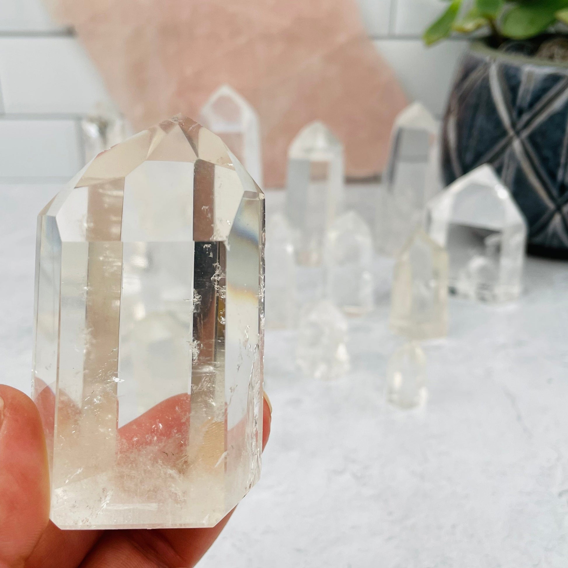 Crystal Quartz Point in hand for size reference 