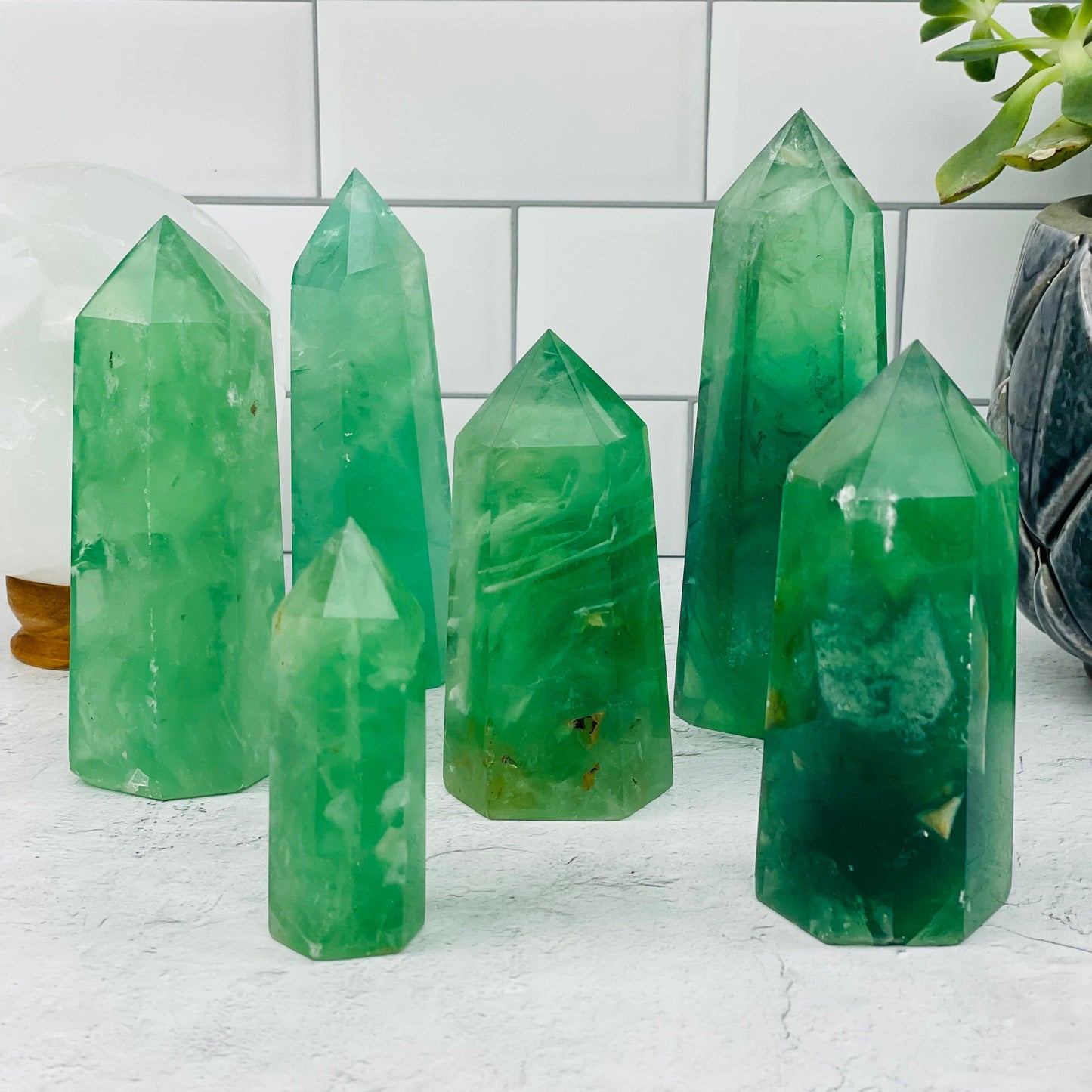 multiple polished points displayed to show the differences in the sizes and color shades 