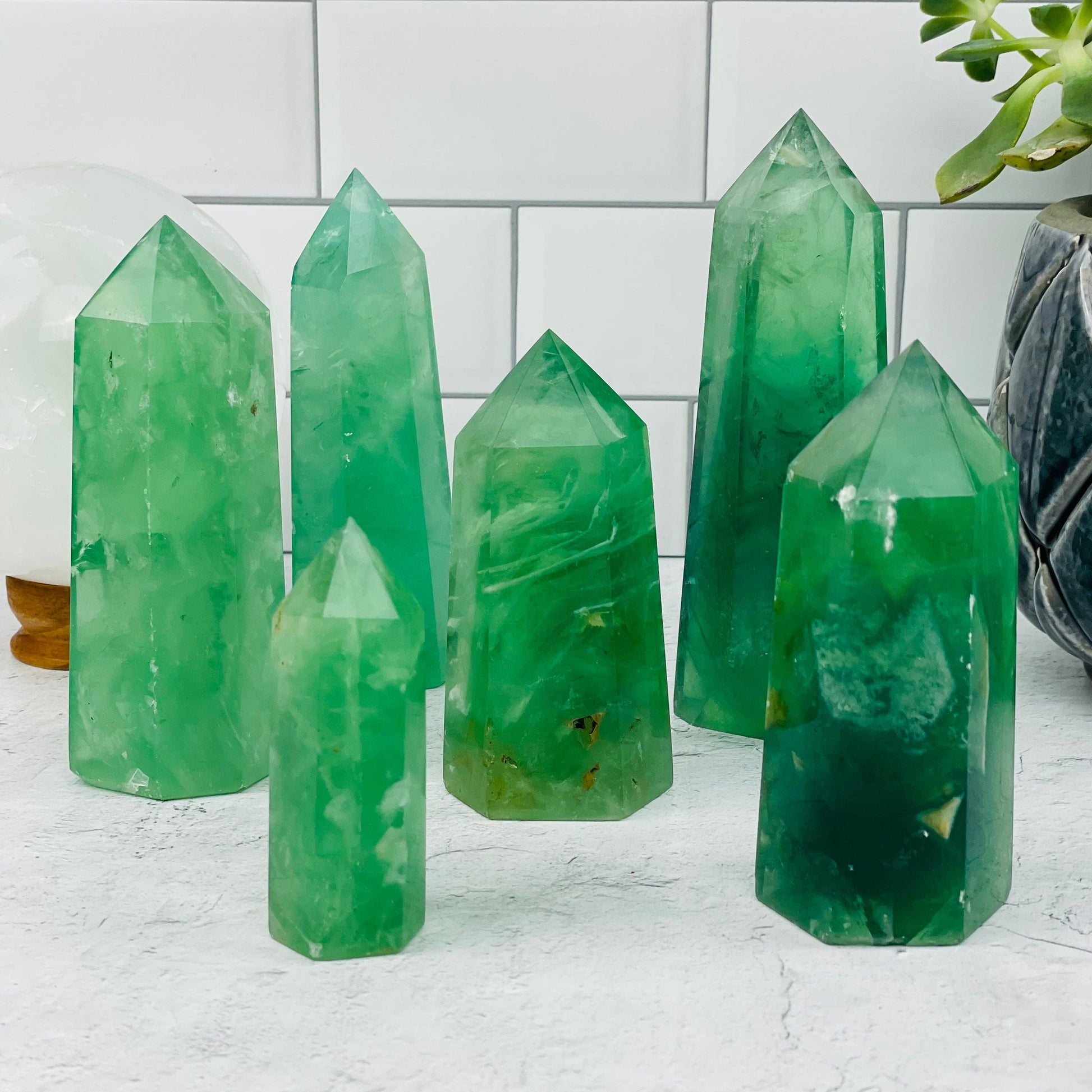 multiple polished points displayed to show the differences in the sizes and color shades 