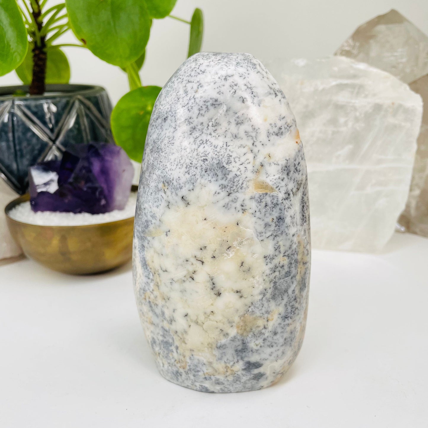 dendritic opal cut base displayed as home decor