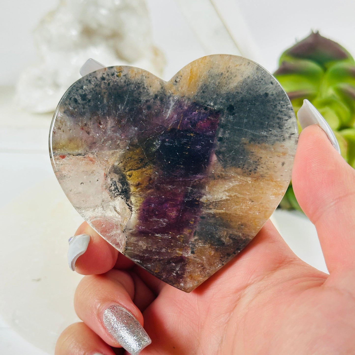 Super Seven Polished Crystal Heart Slice - One-of-a-Kind in hand for size reference
