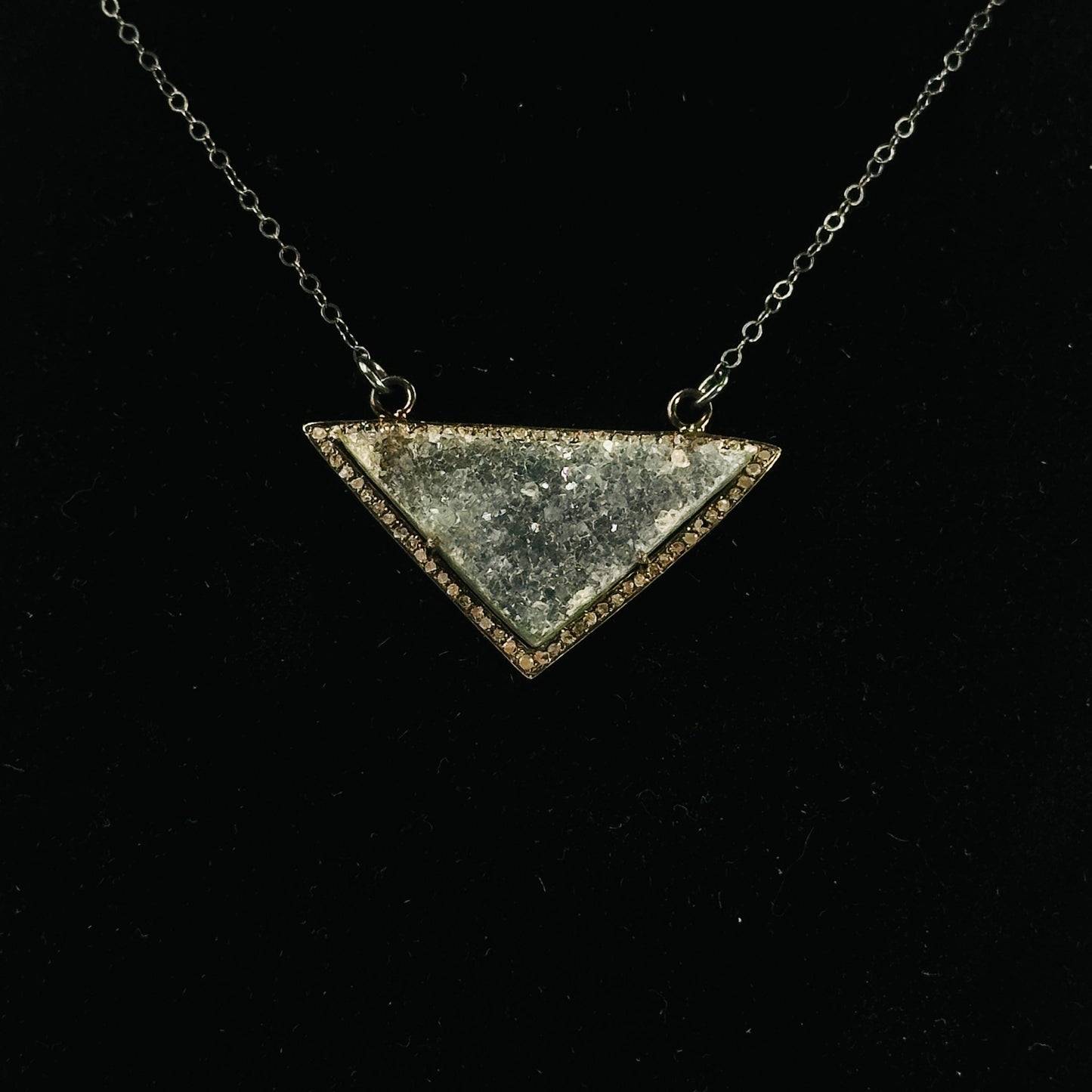 druzy pendant on black background