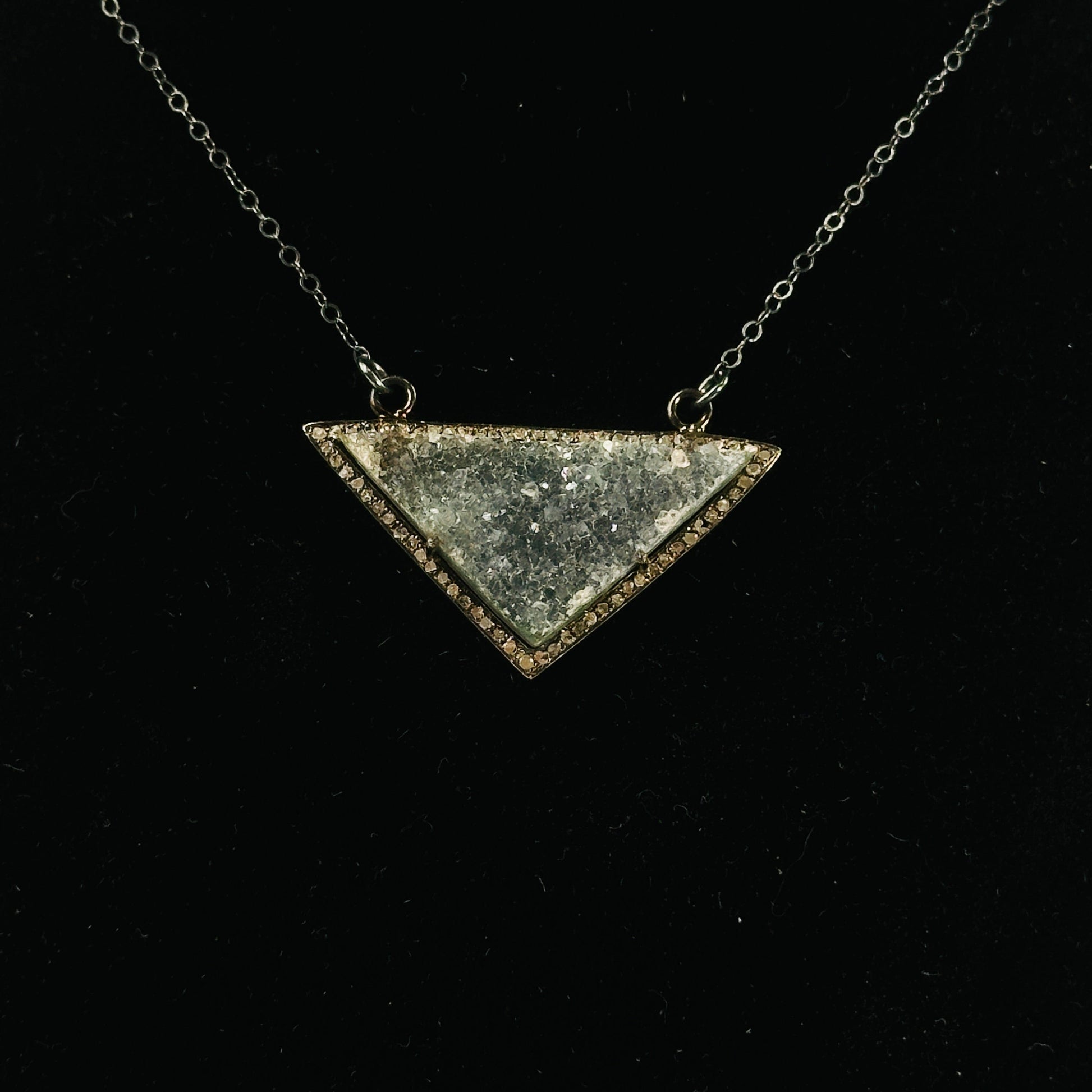 druzy pendant on black background