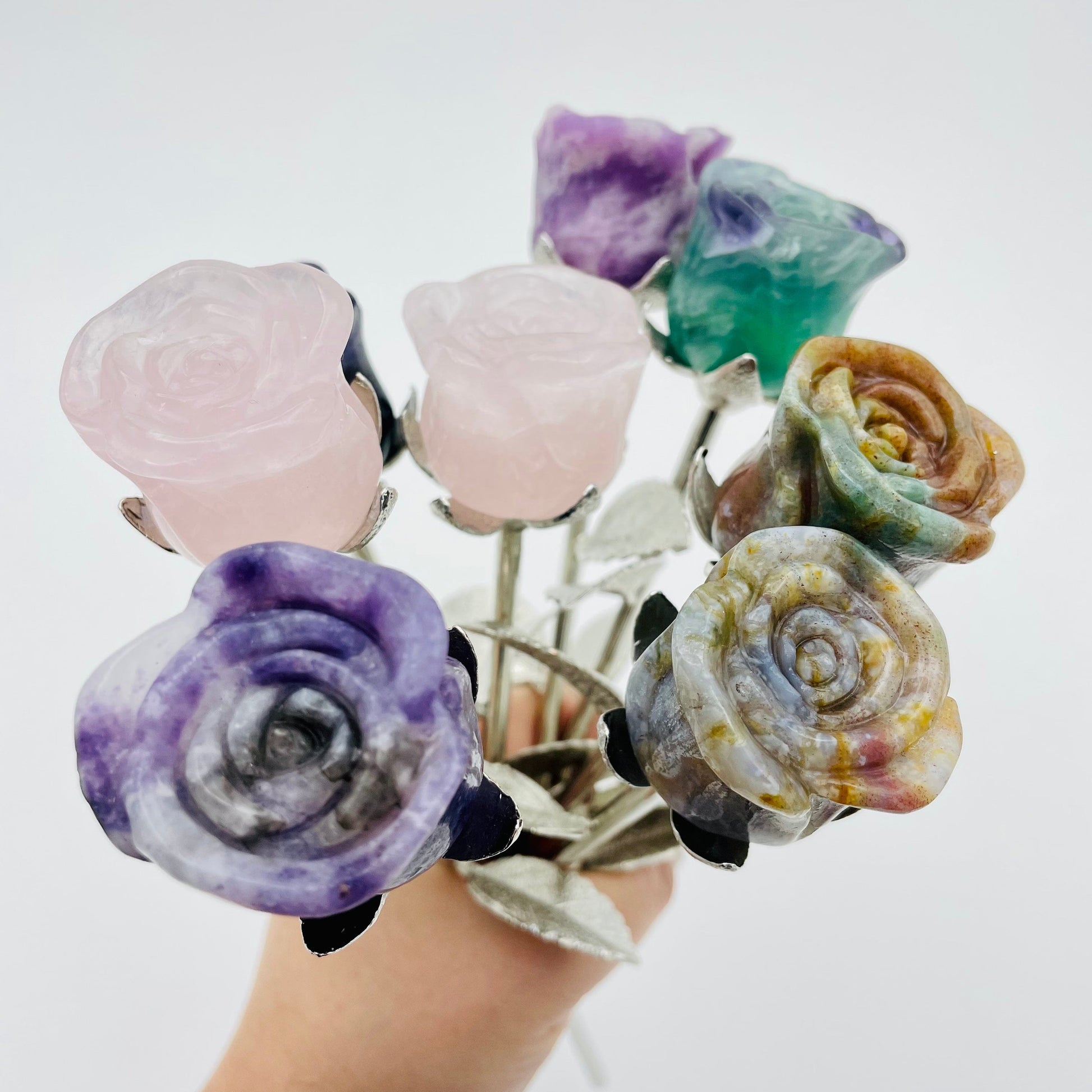 close up of the details on the carved rose buds 