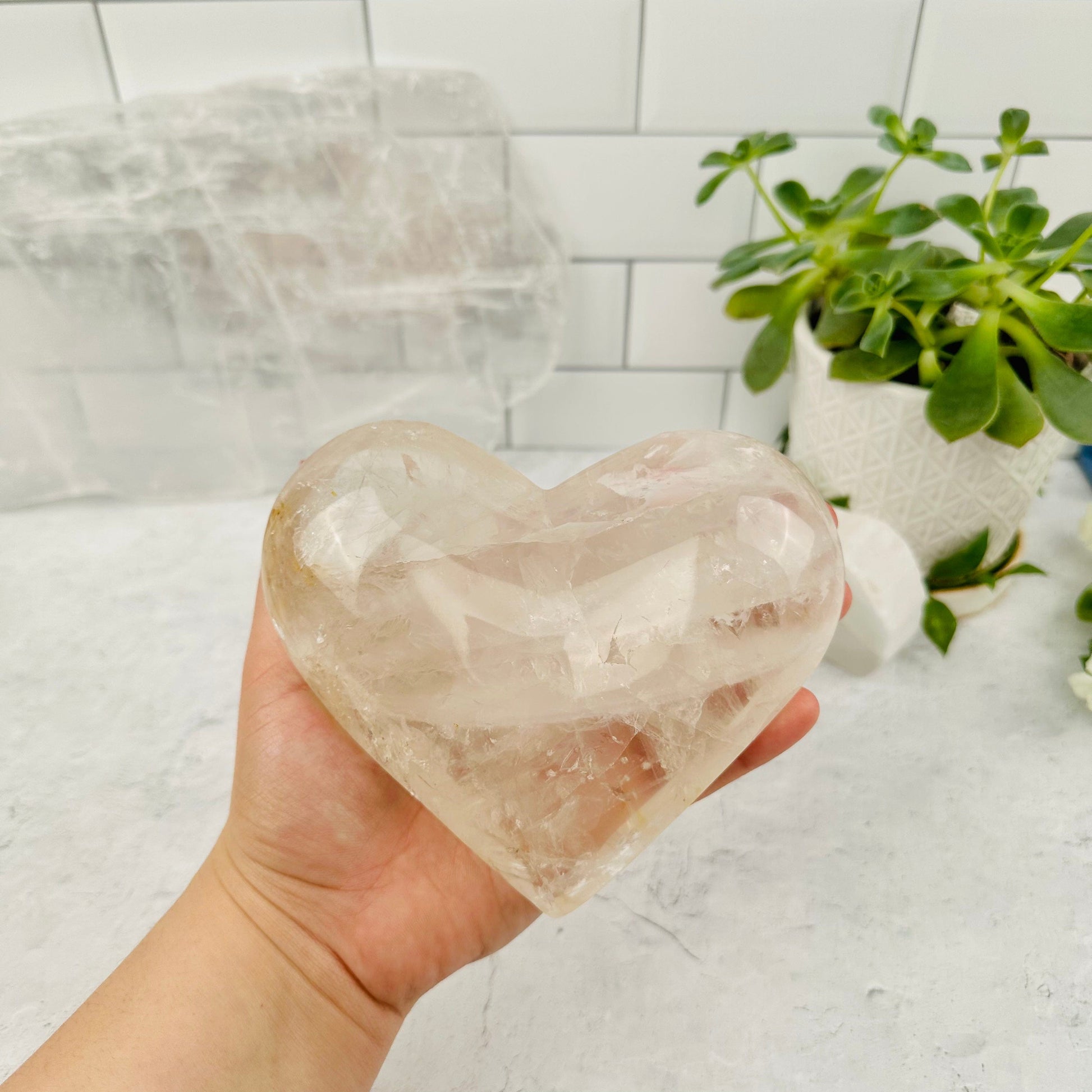 Crystal Quartz Heart - OOAK - in hand for size reference 
