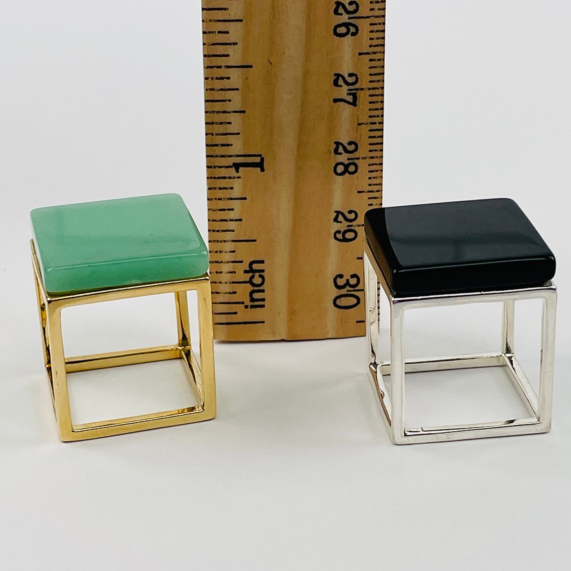 rings next to a ruler for size reference 