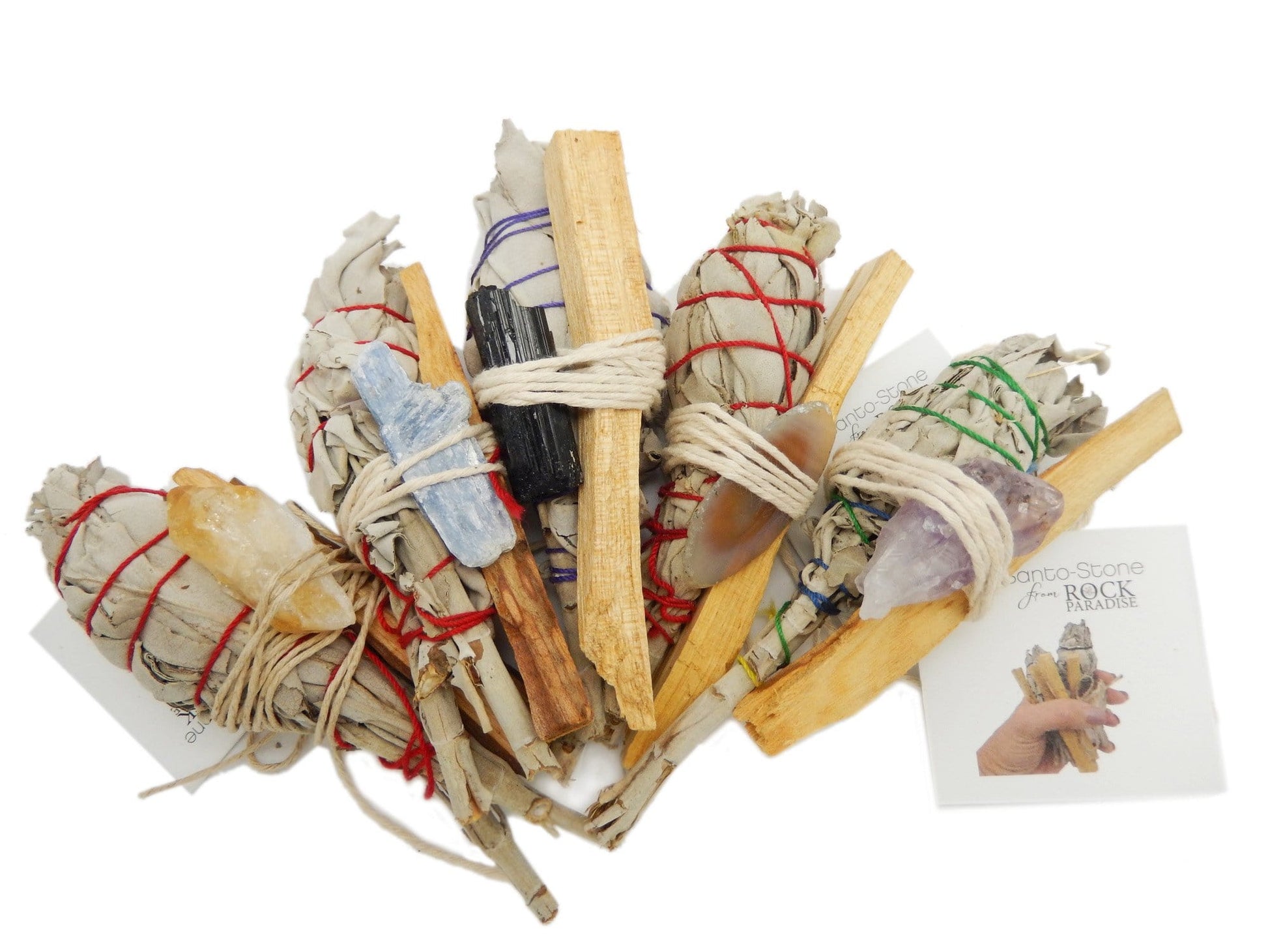 sage bundle palo santo with assorted stone on display for possible variations