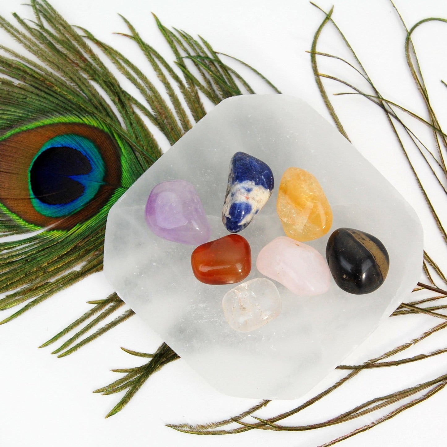close up of selenite charging plate with stones for details and size reference