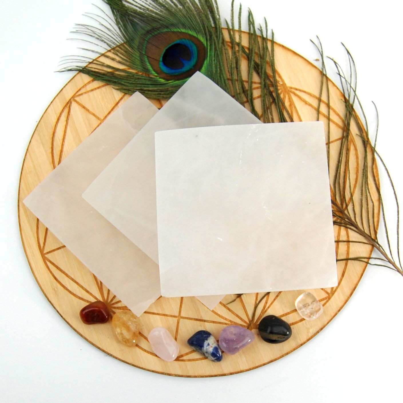 overhead view of square selenite charging plates on display