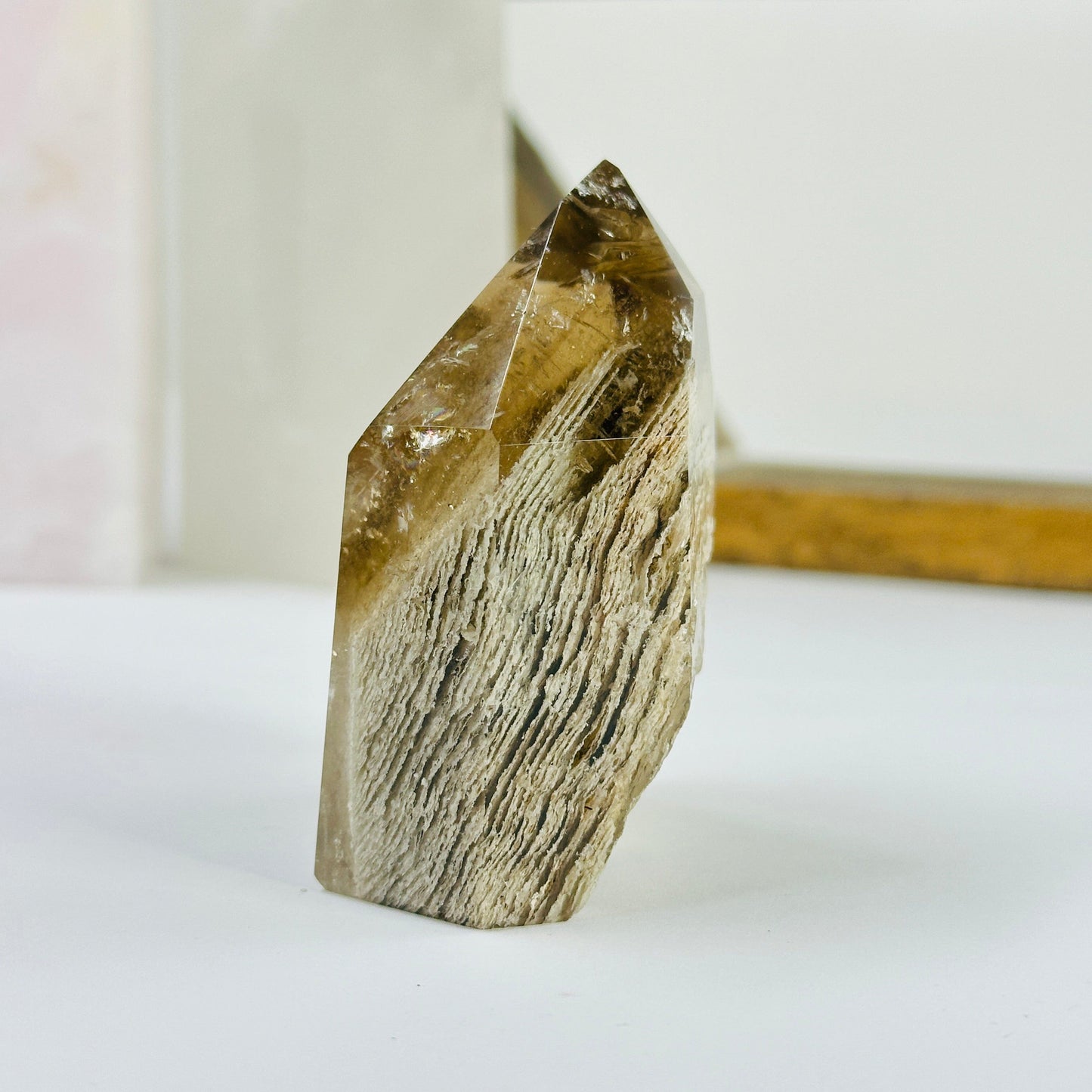 lodalite point with decorations in the background